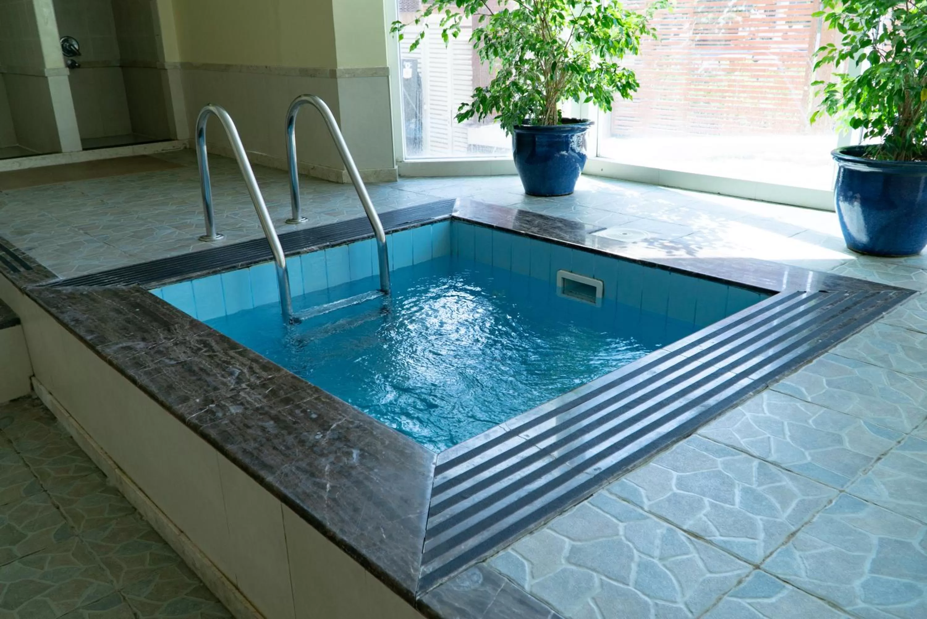 Swimming pool in Al Ain Palace Hotel Abu Dhabi