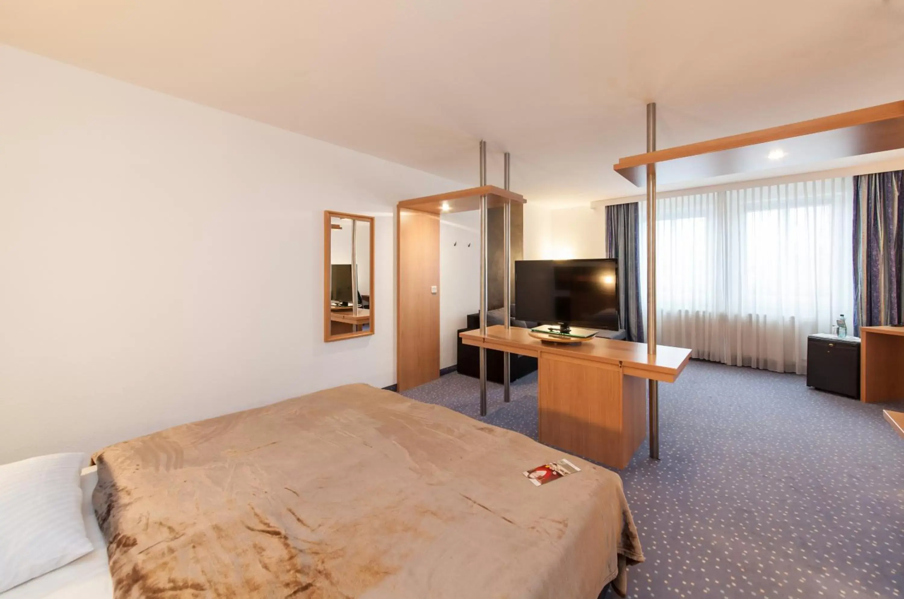 TV and multimedia, Bed in Novum Hotel Seegraben Cottbus