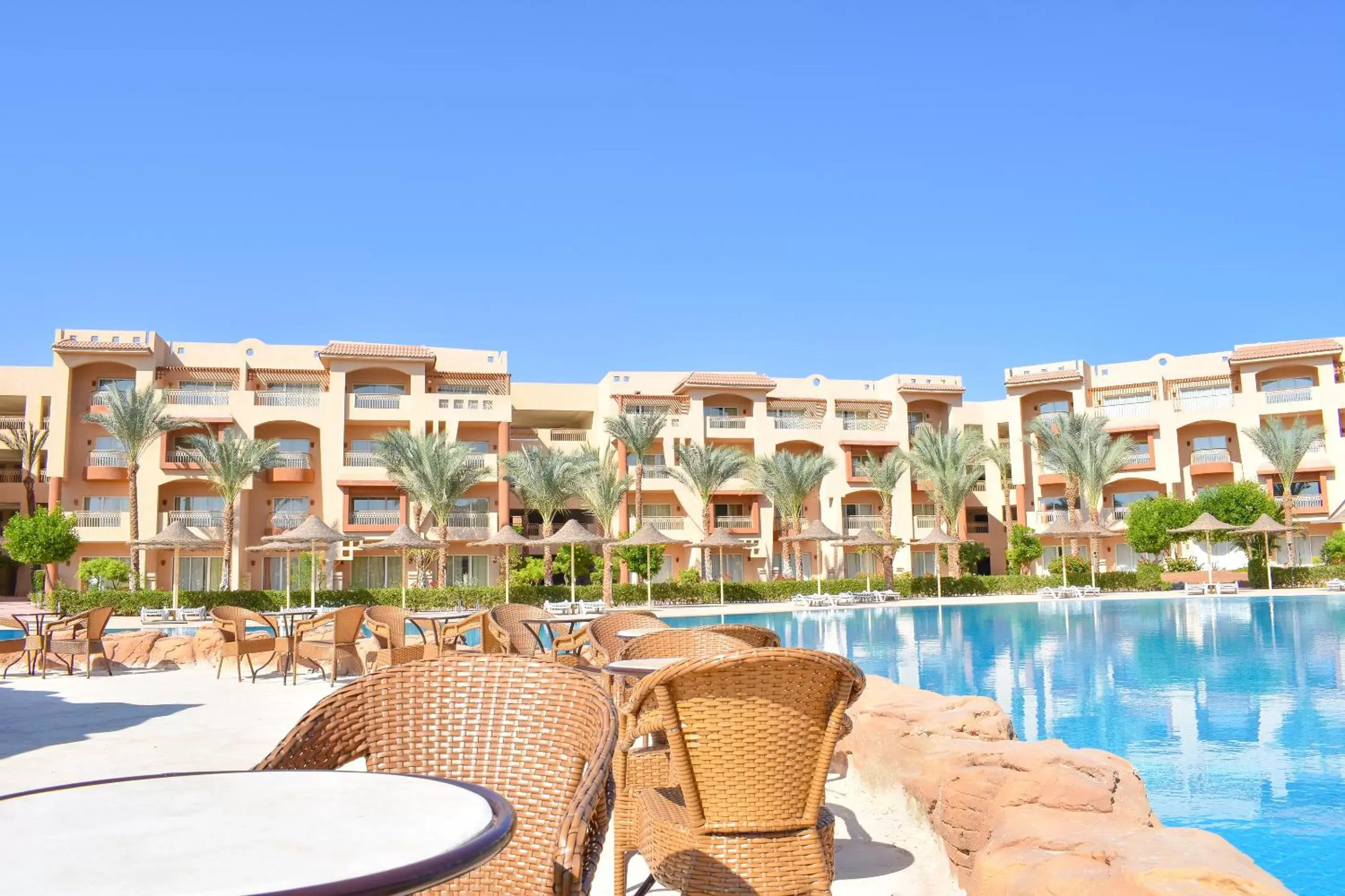 Patio, Swimming Pool in Parrotel Lagoon Waterpark Resort