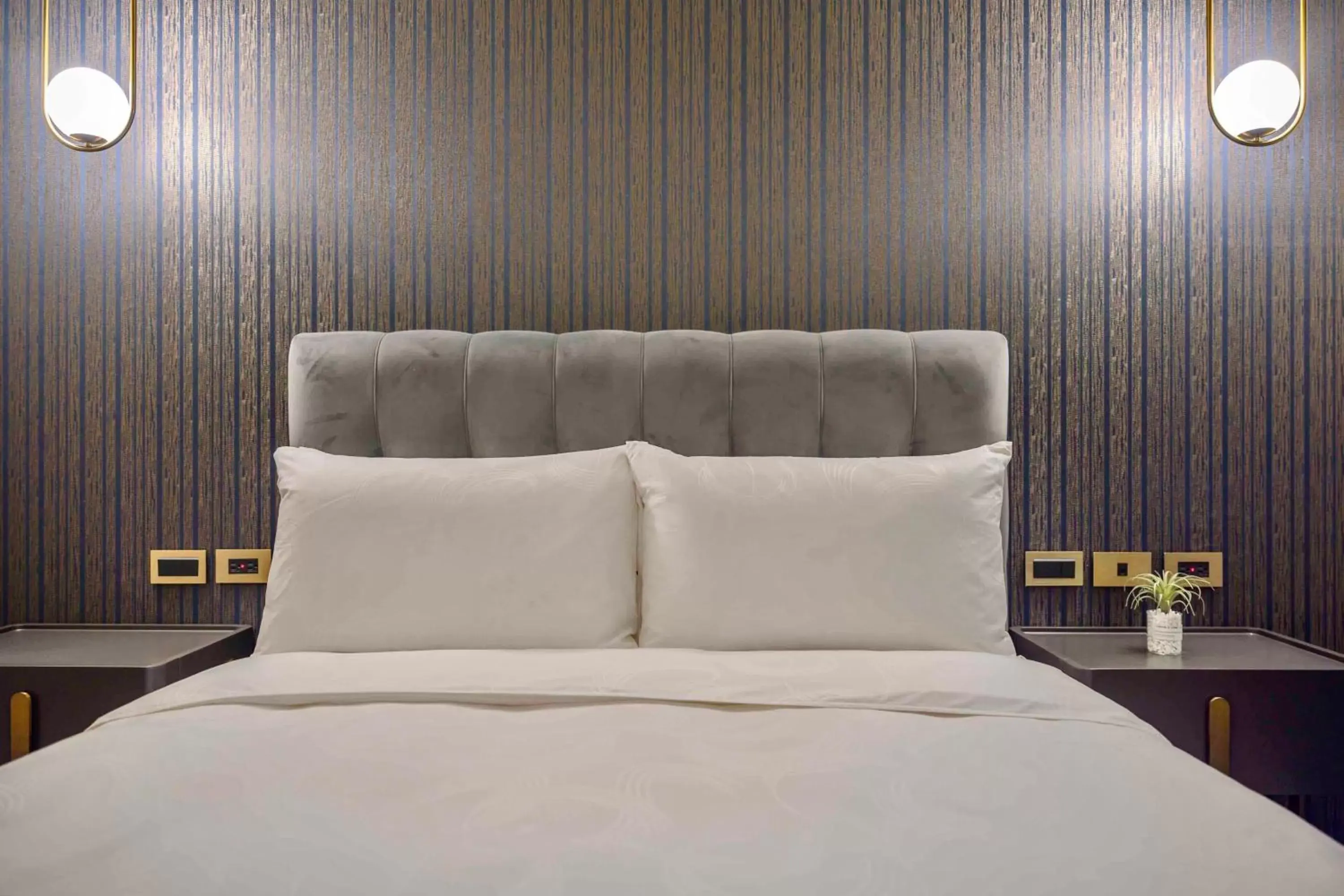 Bed in Tenz Go Hotel Bed in Tenz Go Hotel