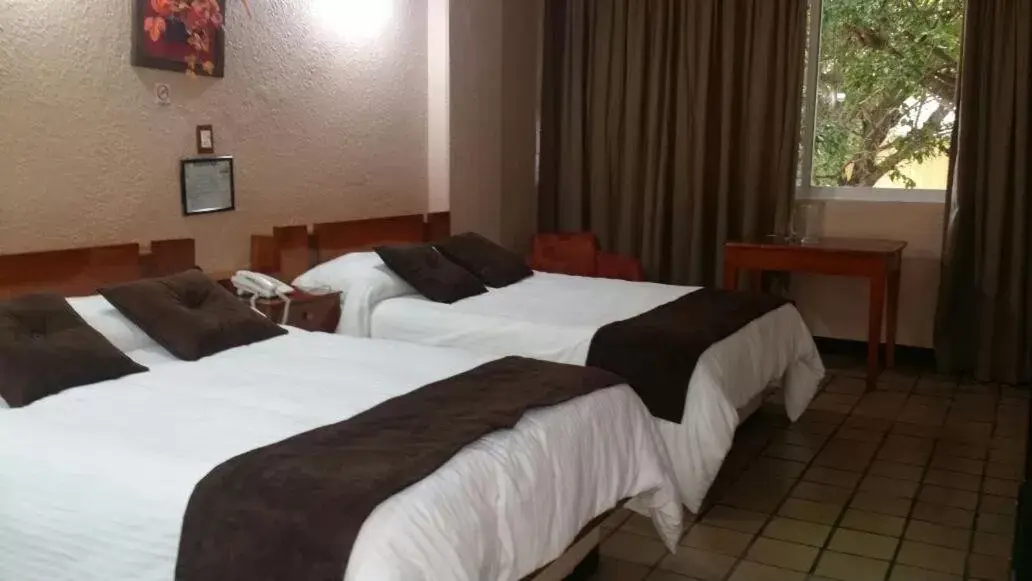 Bed in Hotel Cabildos