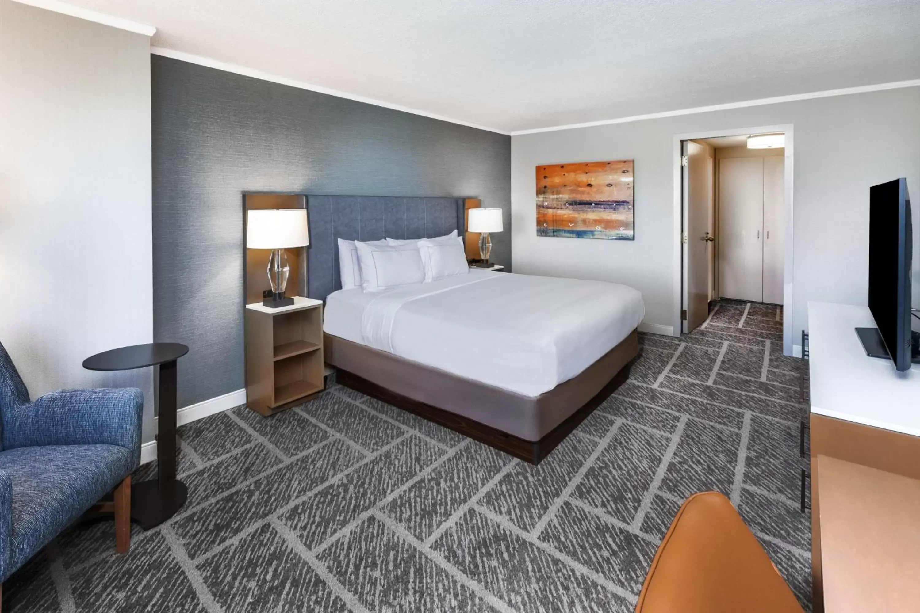 Bed in DoubleTree by Hilton Tulsa at Warren Place