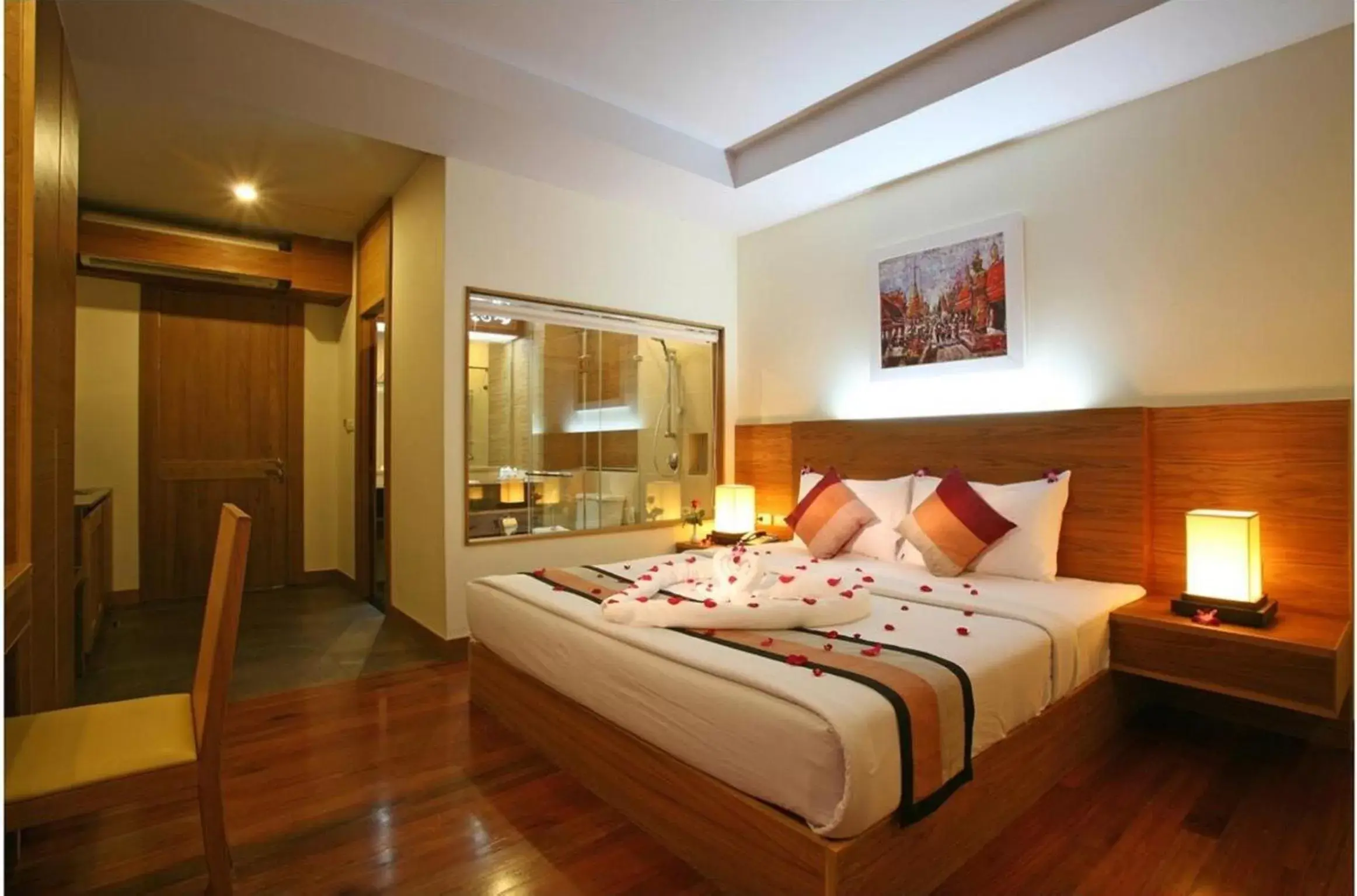 Bed in Baan Saikao Plaza Hotel & Service Apartment