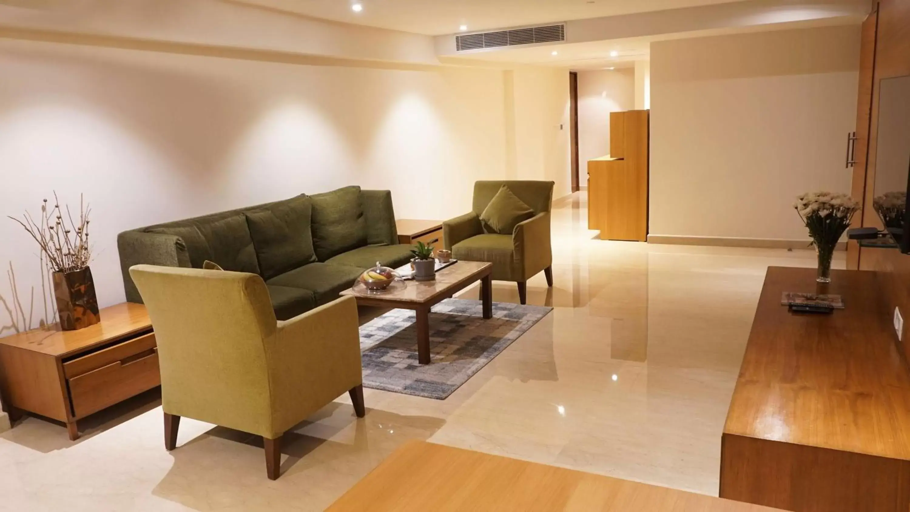 Photo of the whole room, Seating Area in Radisson Blu Plaza Hotel Hyderabad Banjara Hills
