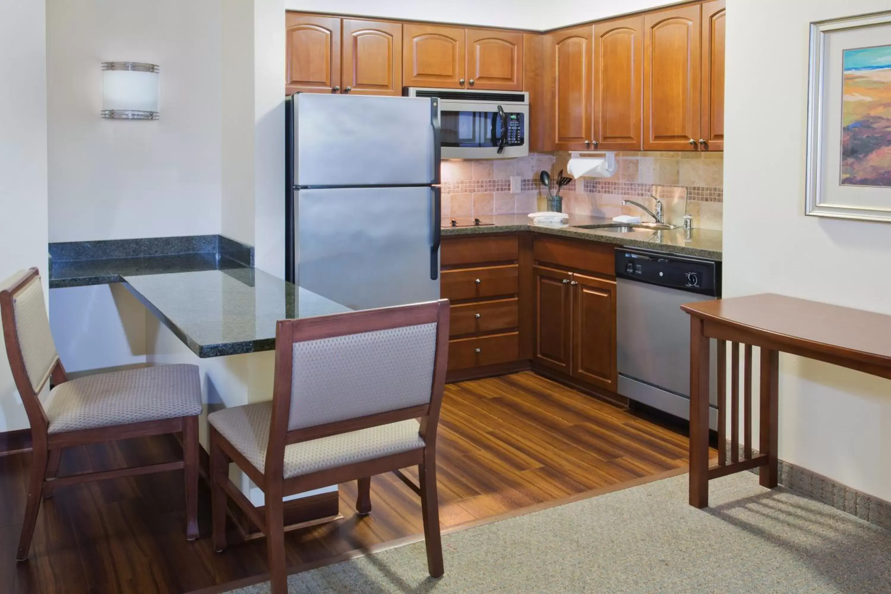 Bedroom, Kitchen/Kitchenette in Staybridge Suites Everett - Paine Field, an IHG Hotel