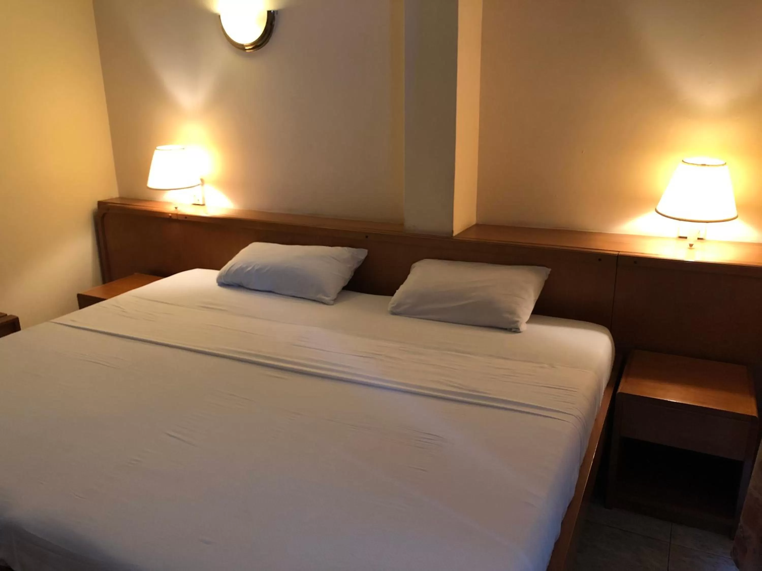 Bed in Maple Leaf Korean Hotel