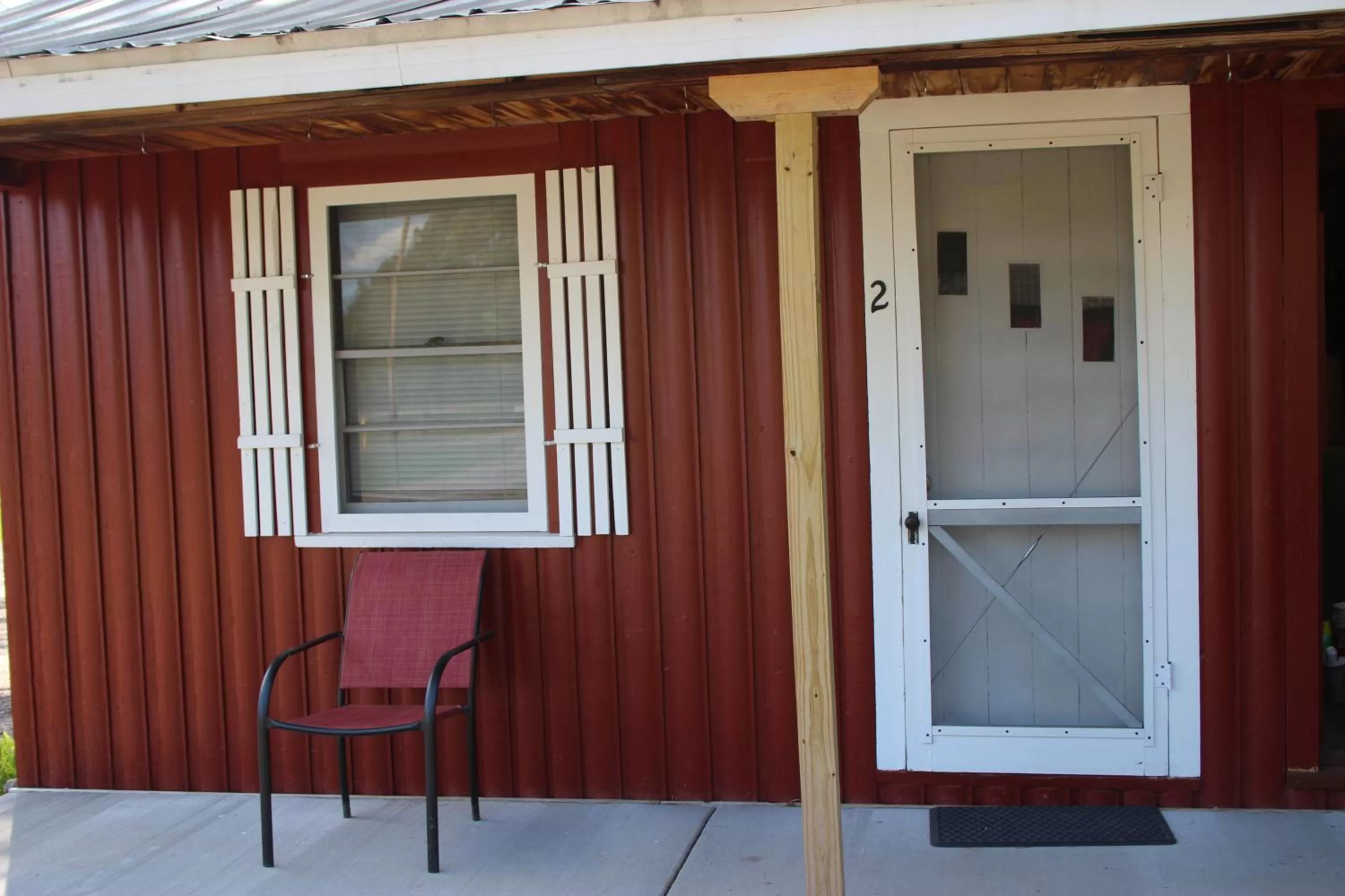 Facade/entrance in Two Rivers Motel and Cabins of Kenton, MI