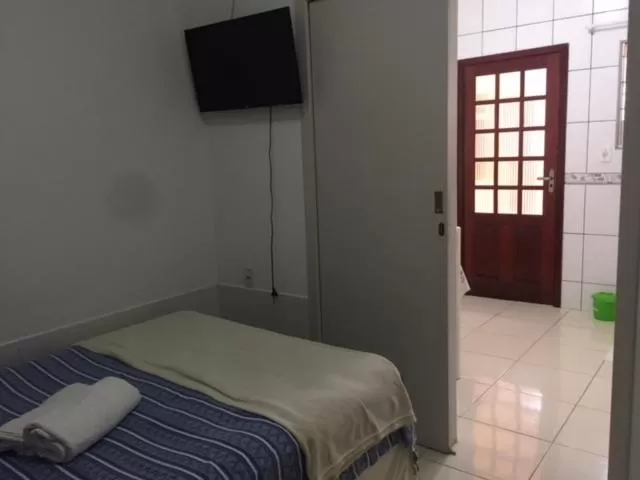 Bed in Pousada Almeida