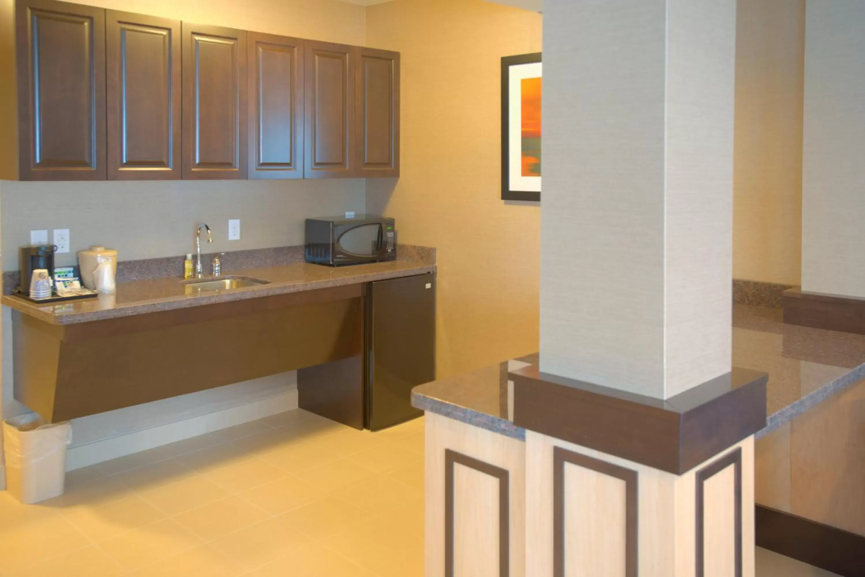 Photo of the whole room, Kitchen/Kitchenette in Holiday Inn Express & Suites Tacoma Downtown, an IHG Hotel