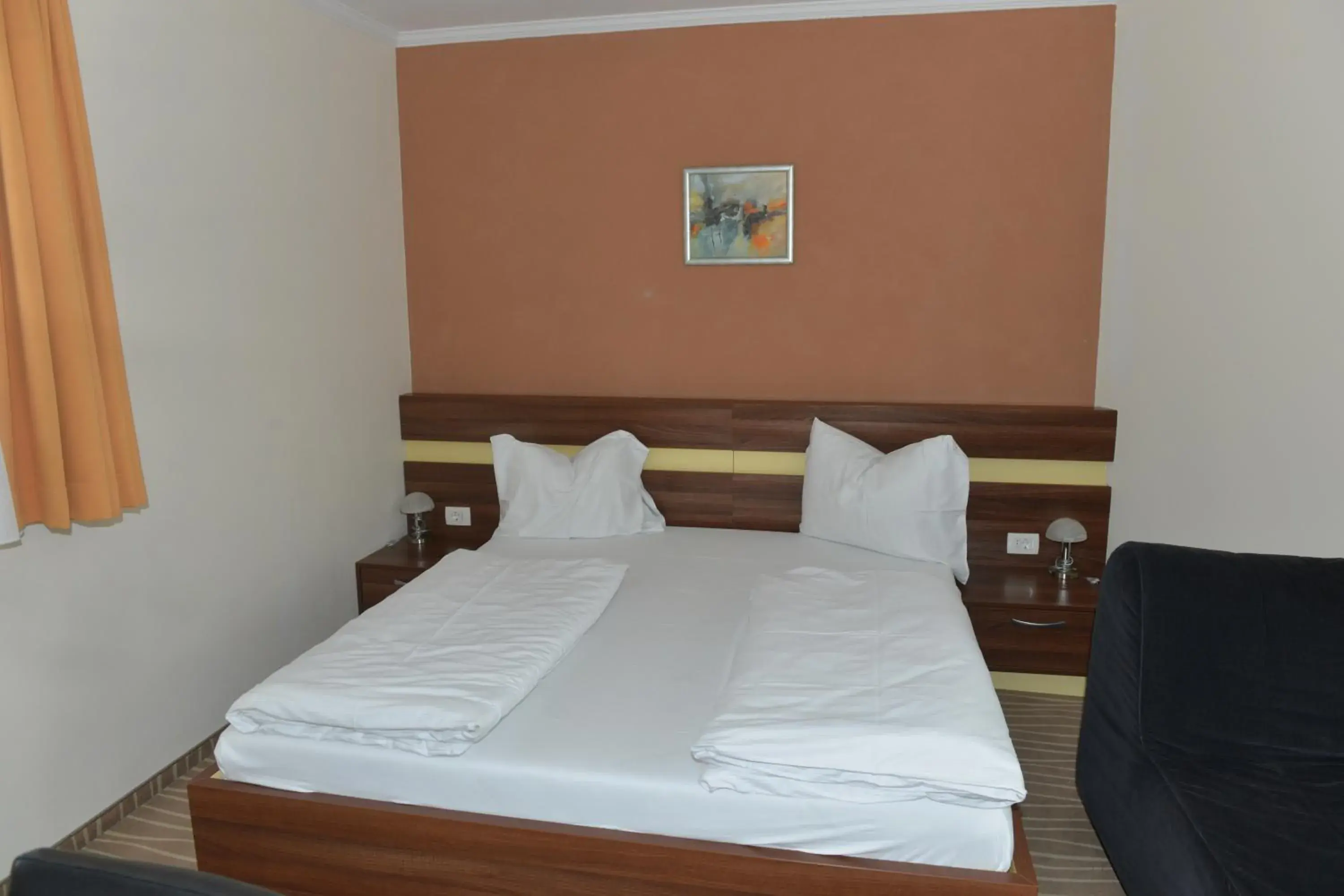 Bed in Primus Hotel & Apartments