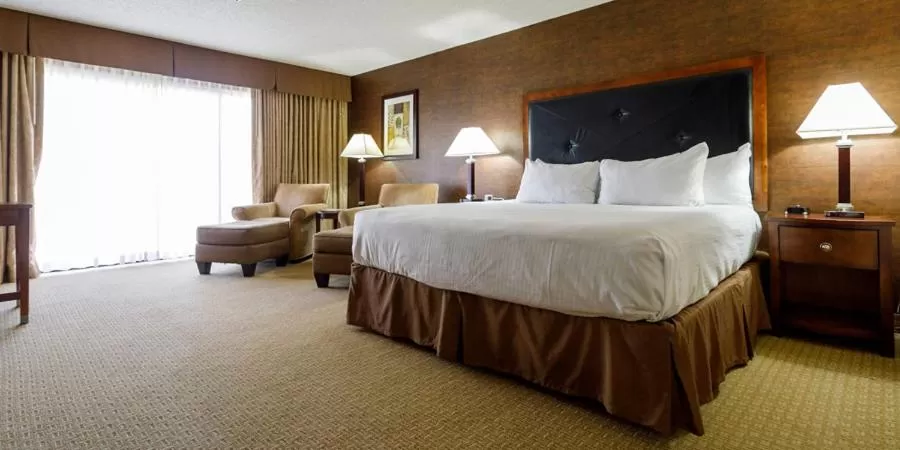 Bed in Maverick Hotel and Casino by Red Lion Hotels