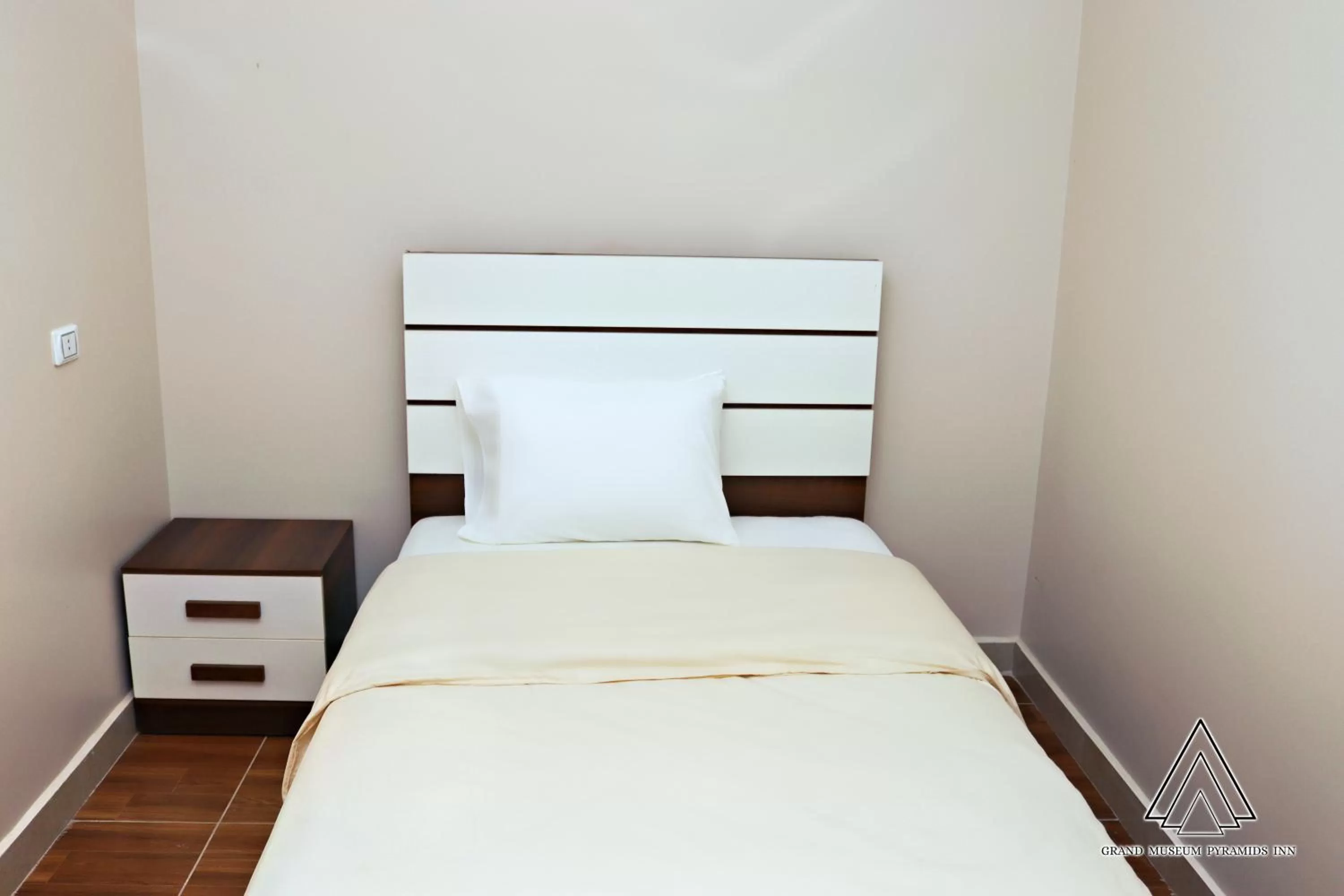 Bed in Grand Museum Pyramids Inn