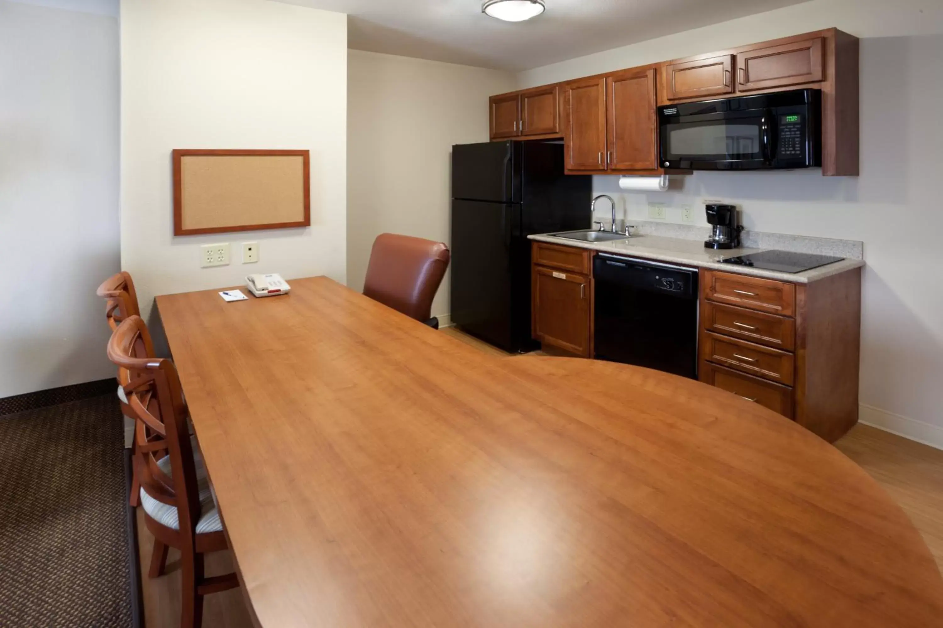 Bedroom, Kitchen/Kitchenette in Candlewood Suites San Antonio NW Near SeaWorld, an IHG Hotel