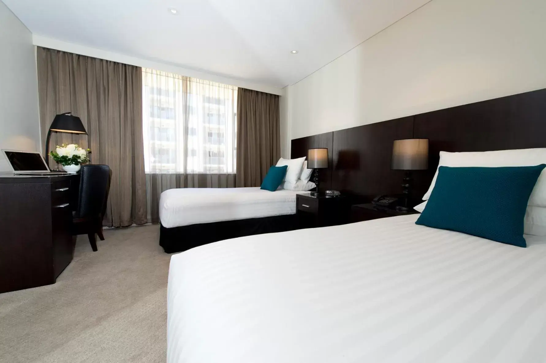 Bed in Canberra Rex Hotel