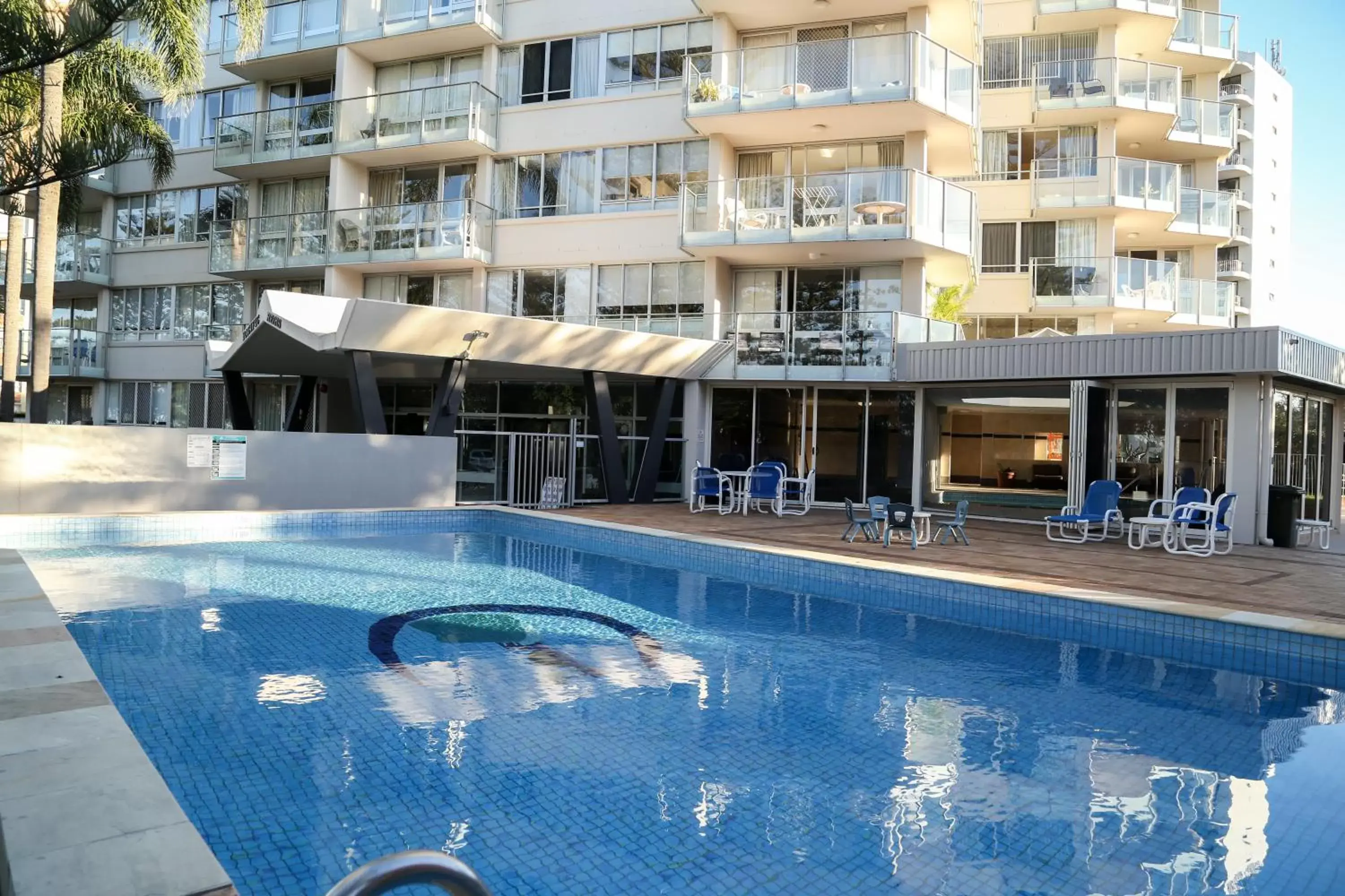 Property building, Swimming Pool in Pacific Regis Beachfront Holiday Apartments