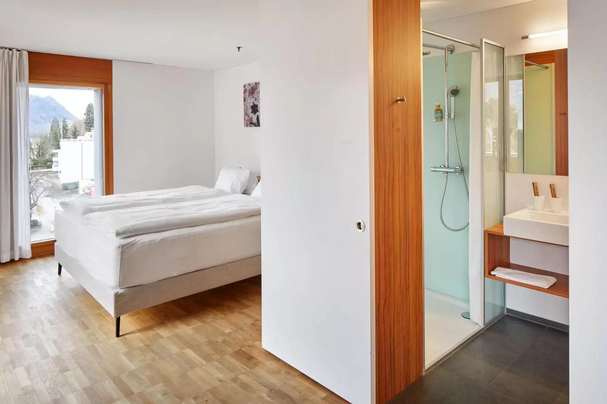 Bed in Hotel Rössli Gourmet & Spa