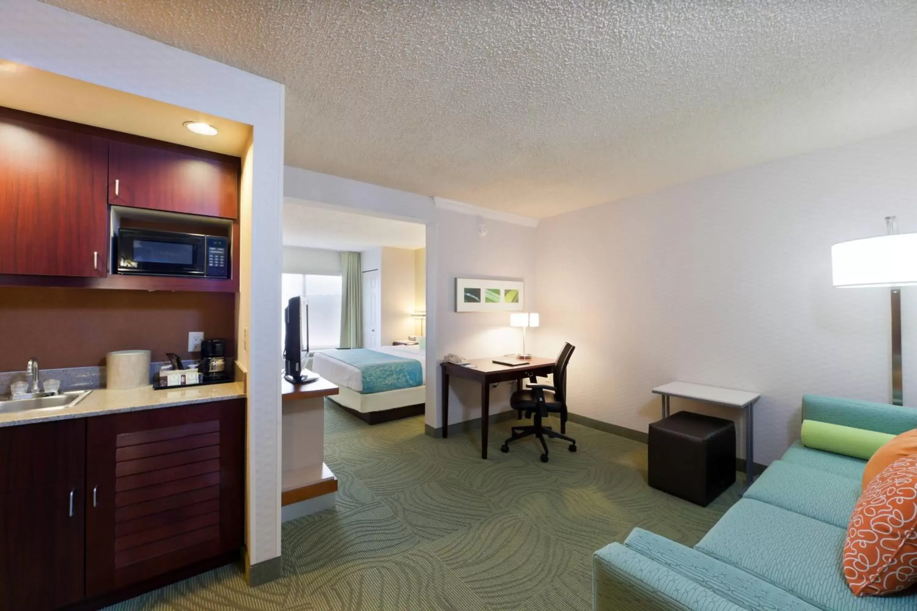 Photo of the whole room, TV/Entertainment Center in SpringHill Suites Denver North / Westminster