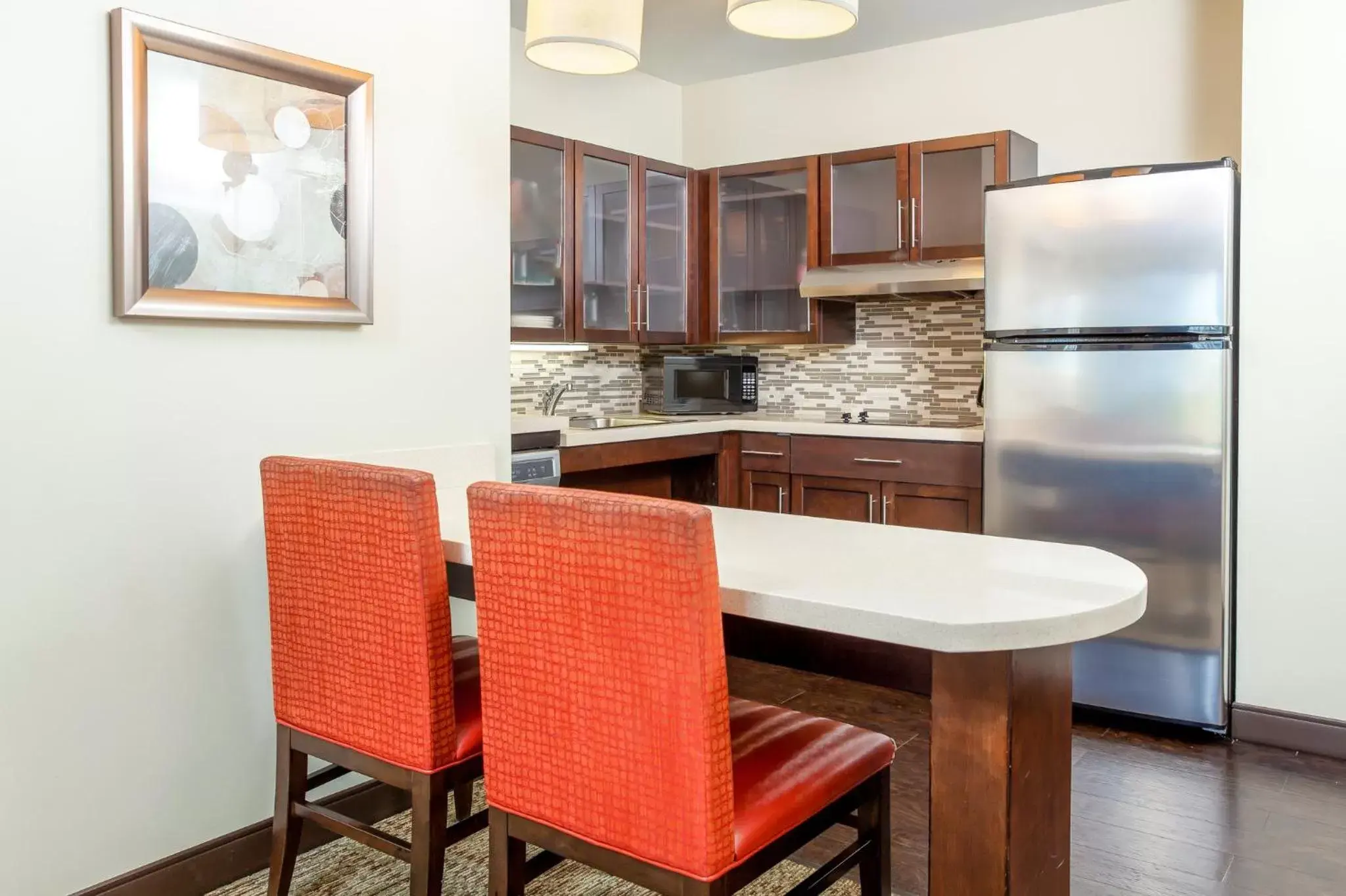 Photo of the whole room, Kitchen/Kitchenette in Staybridge Suites Denver - Central Park, an IHG Hotel