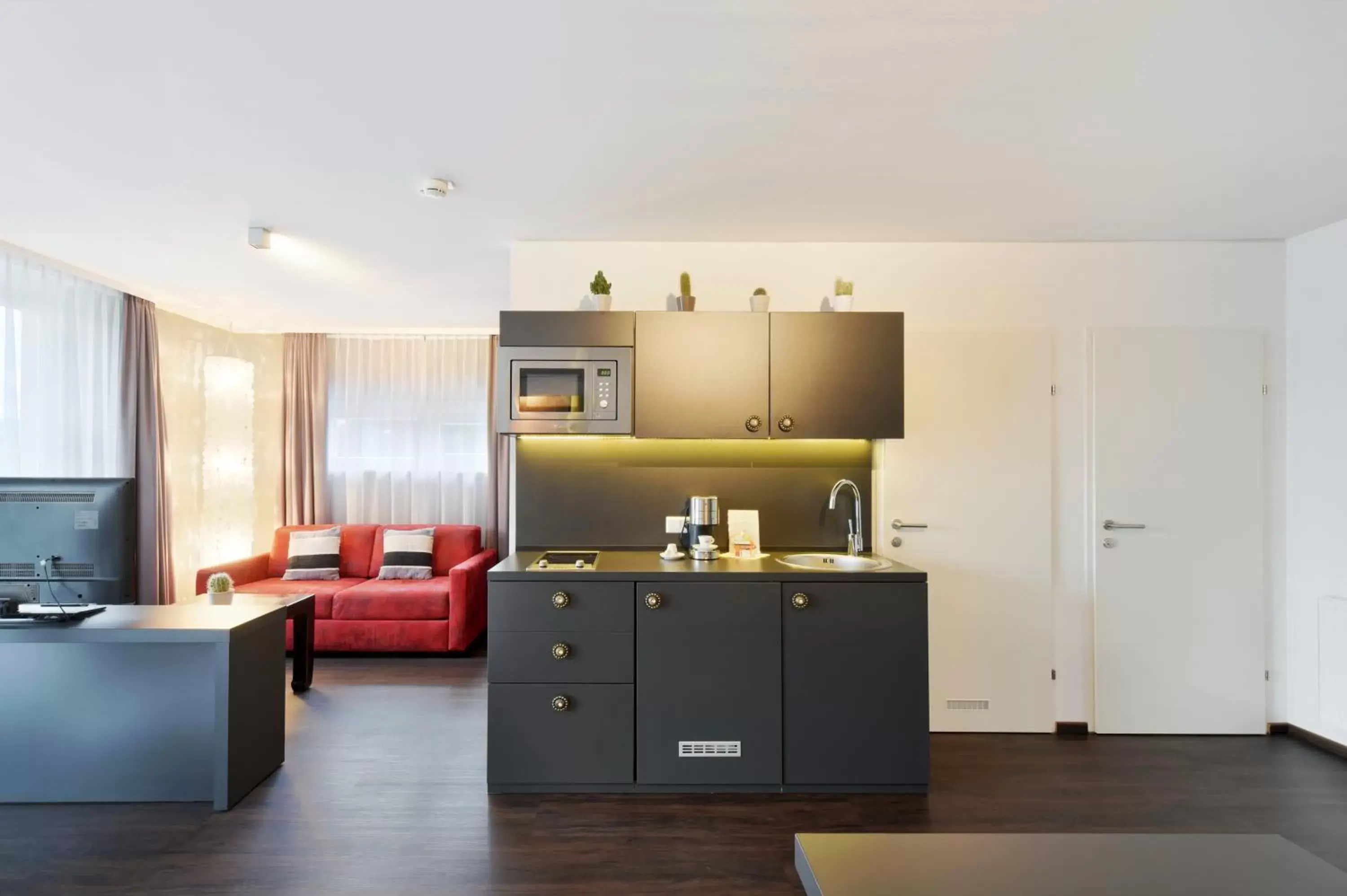 Kitchen/Kitchenette in Amedia Luxury Suites Graz, Trademark Collection by Wyndham