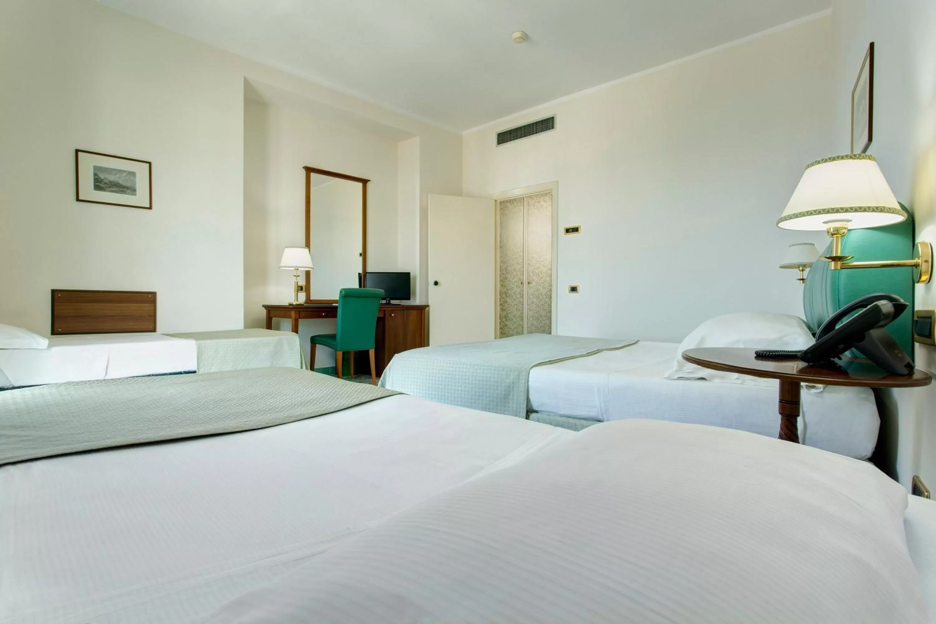 Bed in Lloyd's Baia Hotel