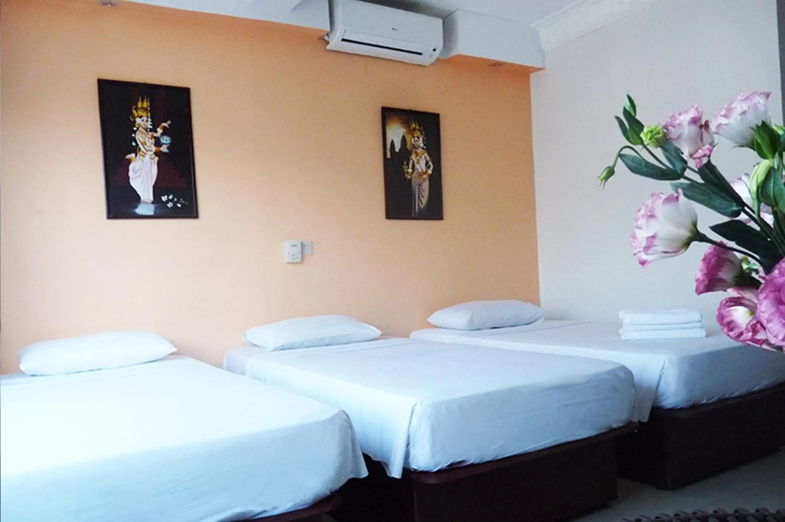 Photo of the whole room, Bed in Angkor International Hotel