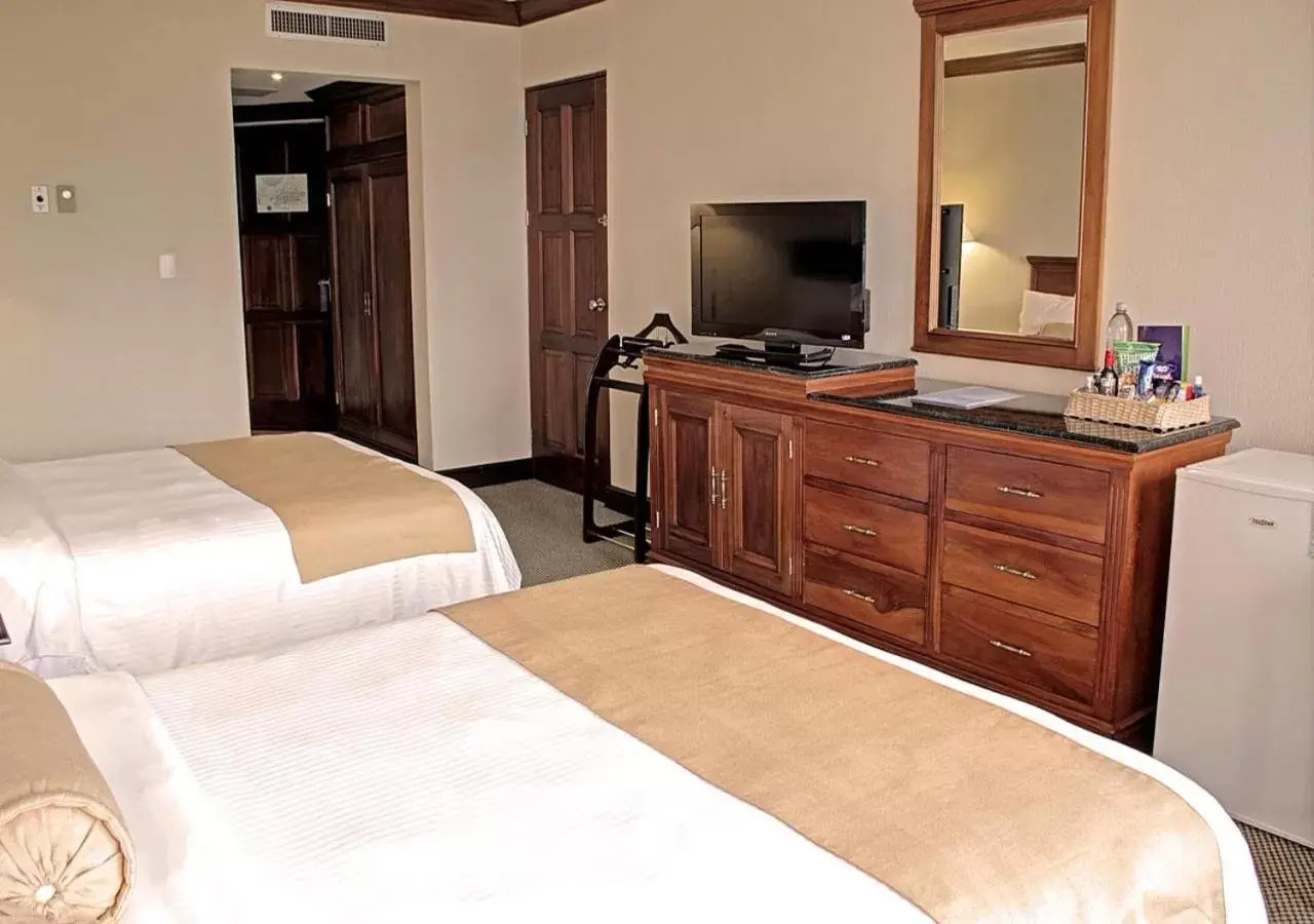 Photo of the whole room, TV/Entertainment Center in Wyndham San Jose Herradura