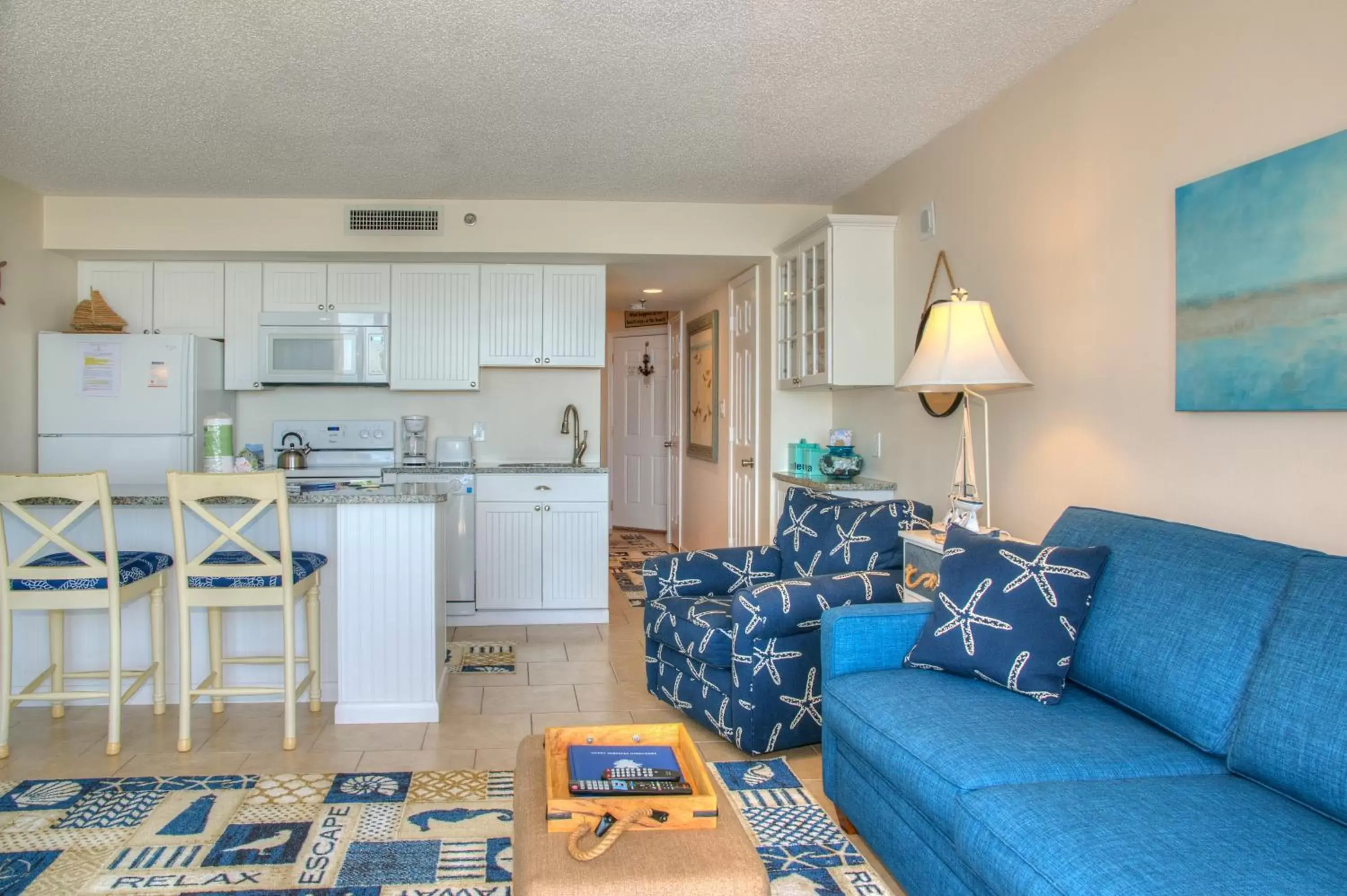 Living room, Kitchen/Kitchenette in Ocean Forest Plaza by Palmetto Vacations