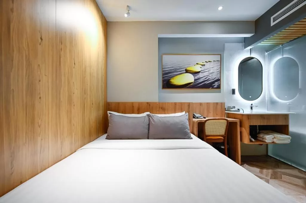 Bed in La Opera Saigon Hotel