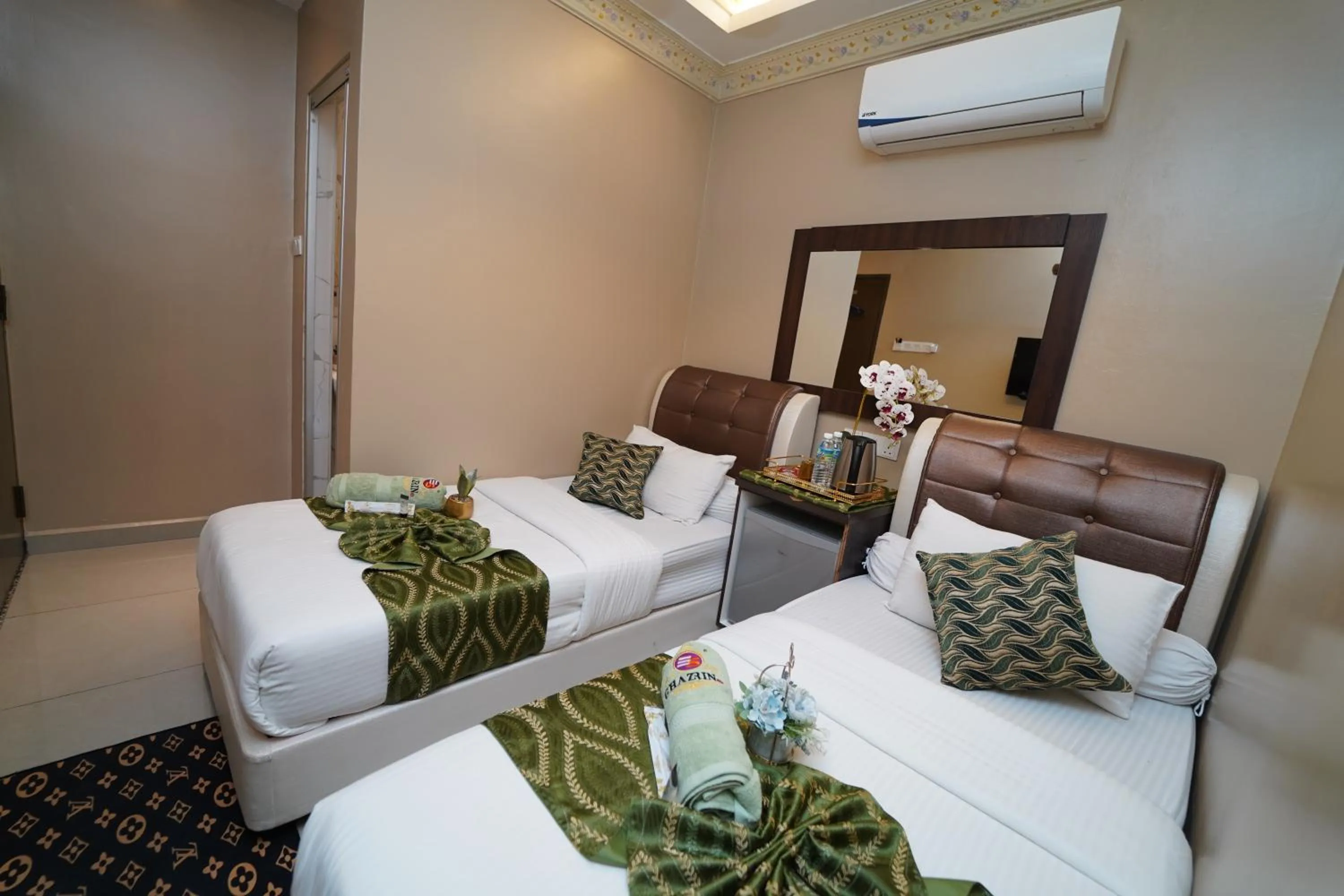 Bed in Ghazrin's Classic Hotel JB