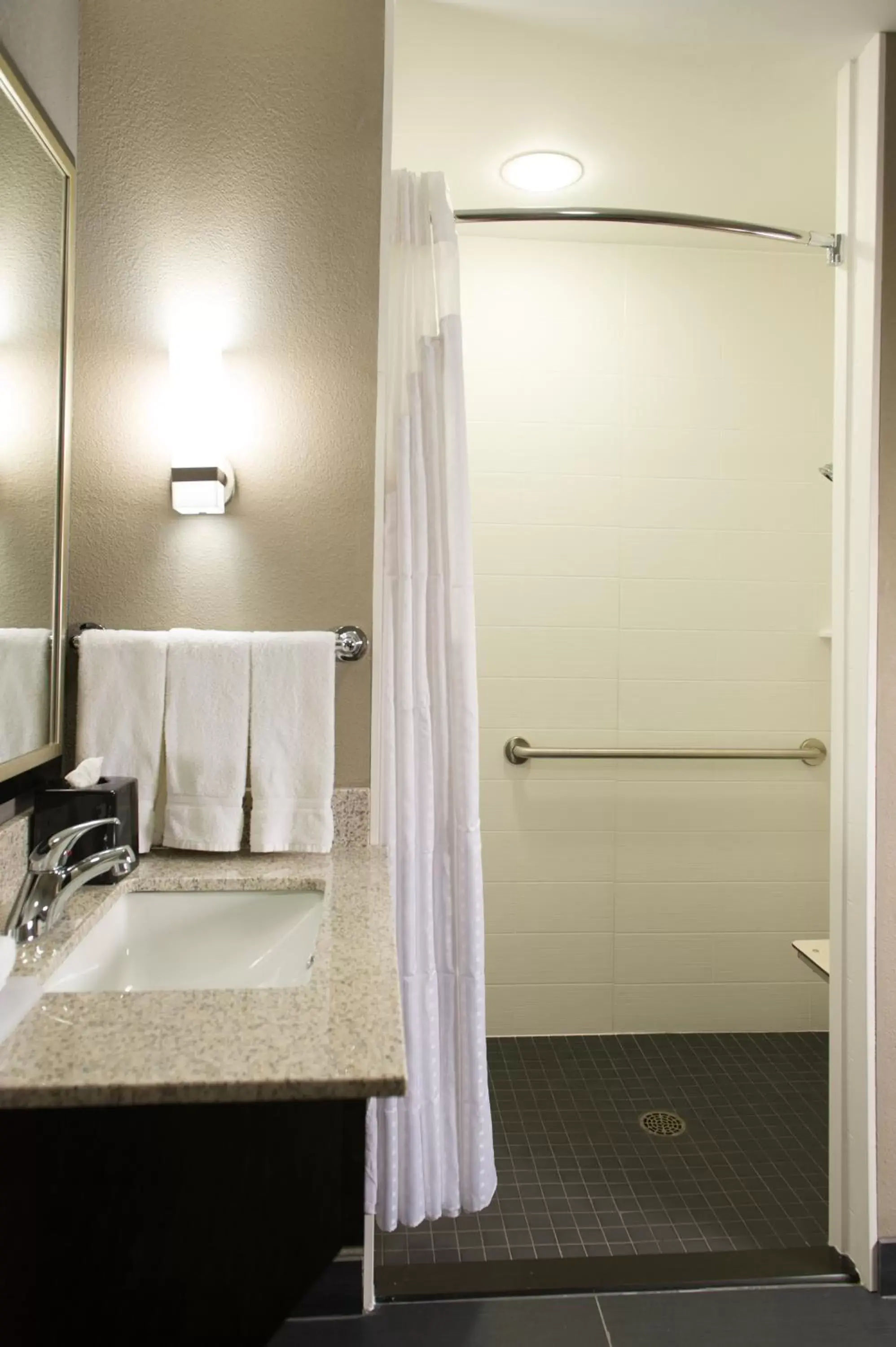 Queen Suite - Mobility Access Roll in Shower- Non-Smoking in Holiday Inn Express and Suites Madison Central, an IHG Hotel Queen Suite - Mobility Access Roll in Shower- Non-Smoking in Holiday Inn Express and Suites Madison Central, an IHG Hotel
