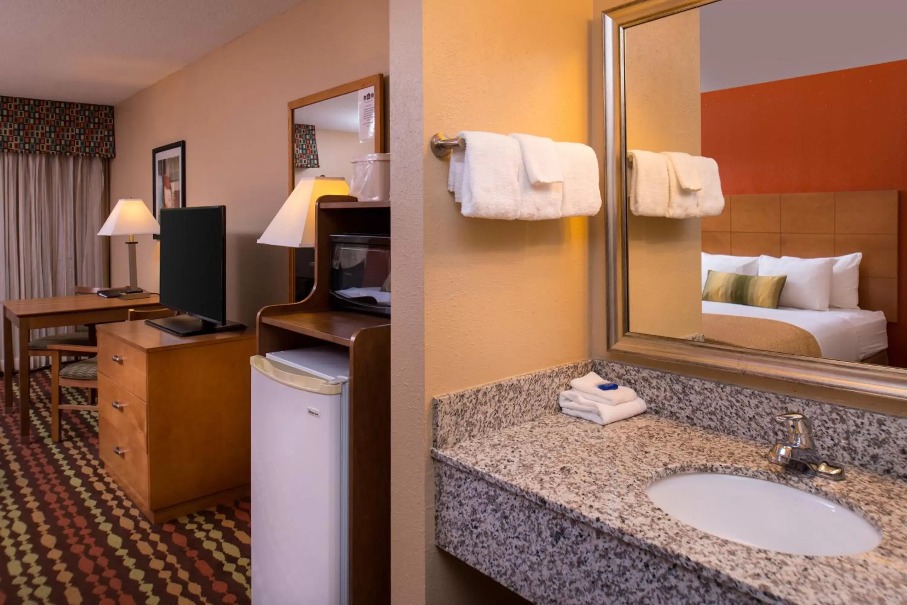 Queen Room with Two Queen Beds and Pool View in Best Western Ambassador Inn & Suites