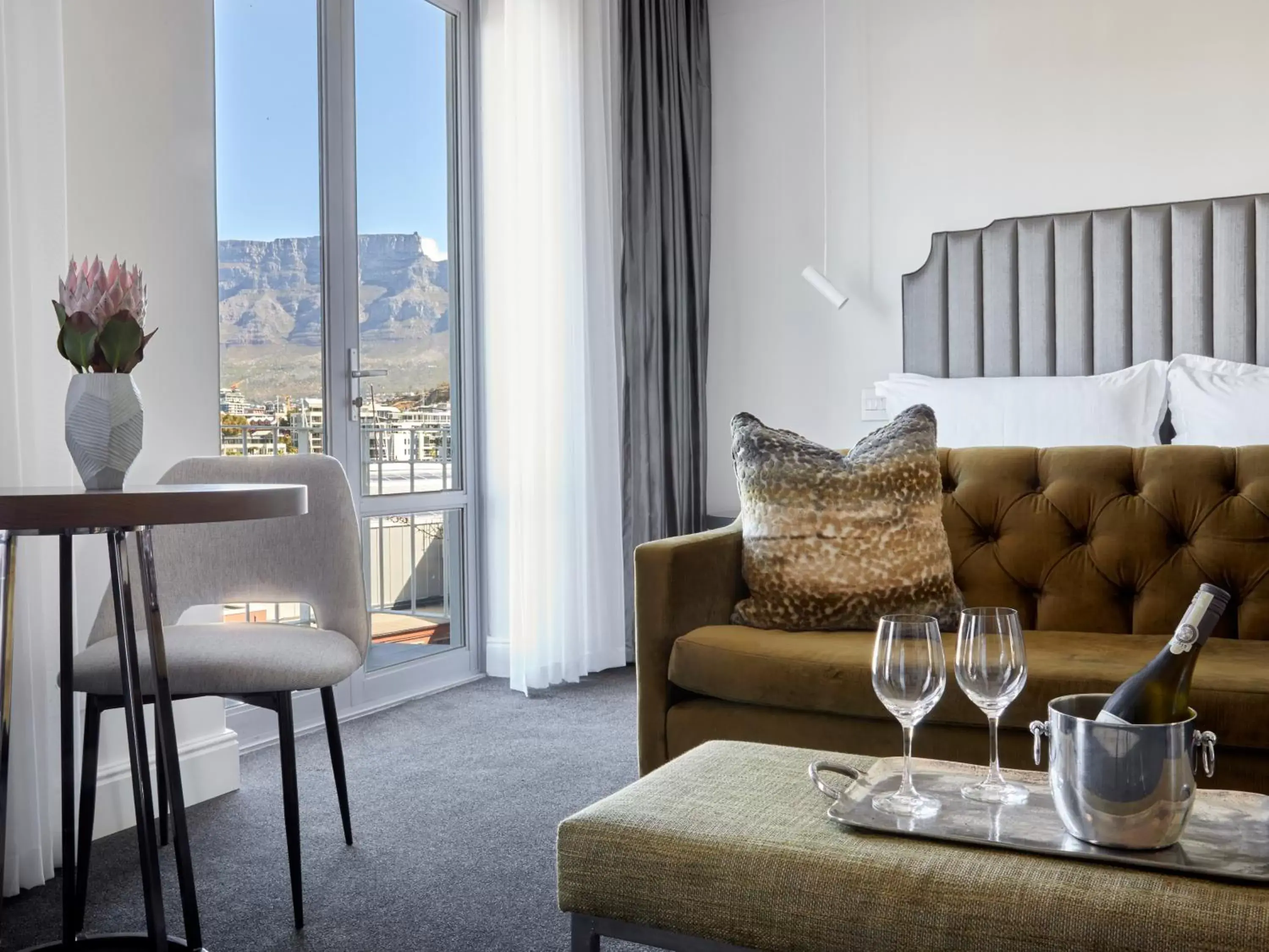 Bedroom, Seating Area in The Manor House at the Queen Victoria Hotel by NEWMARK