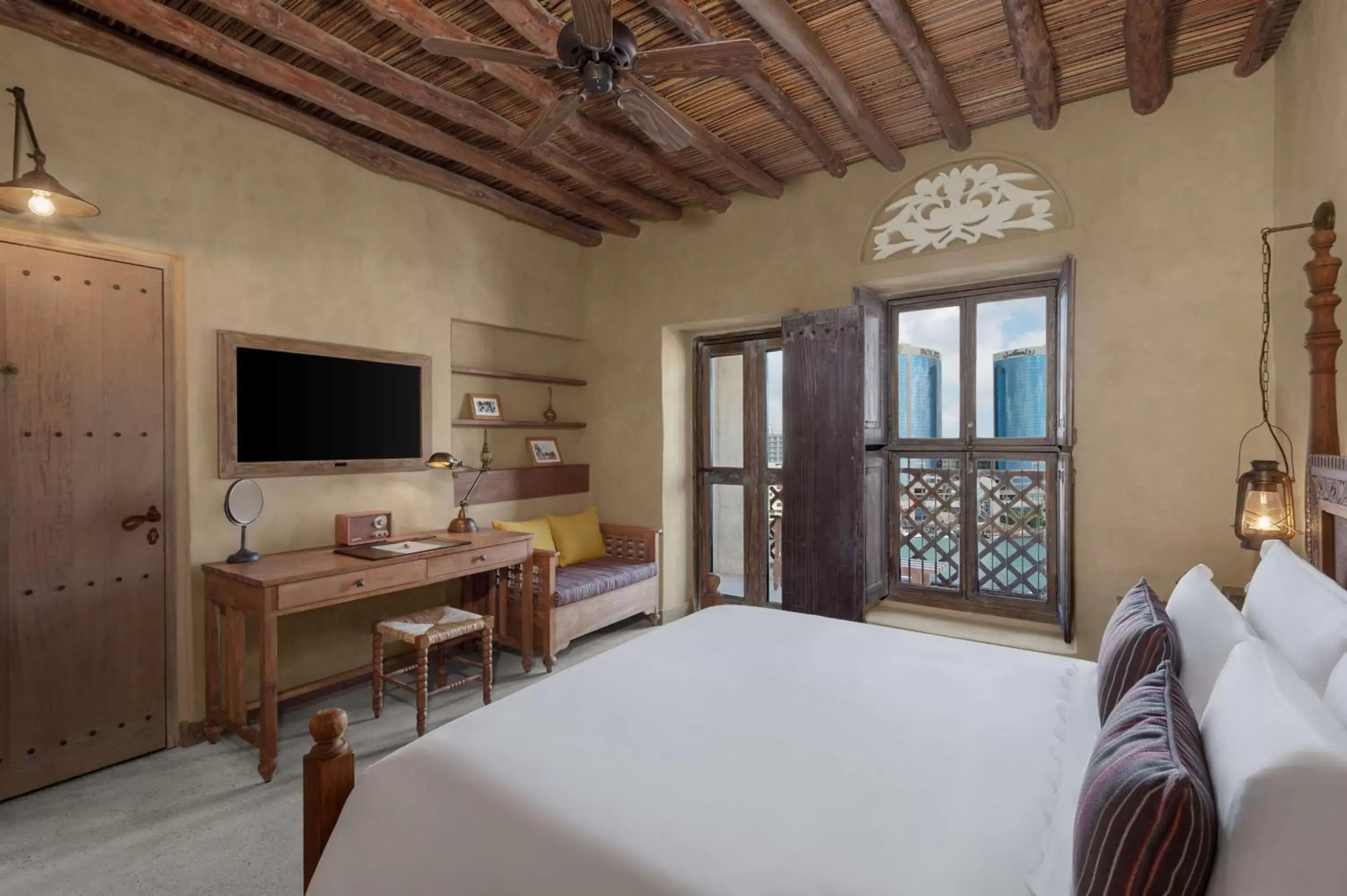 Bedroom, TV/Entertainment Center in Al Seef Heritage Hotel Dubai, Curio Collection by Hilton