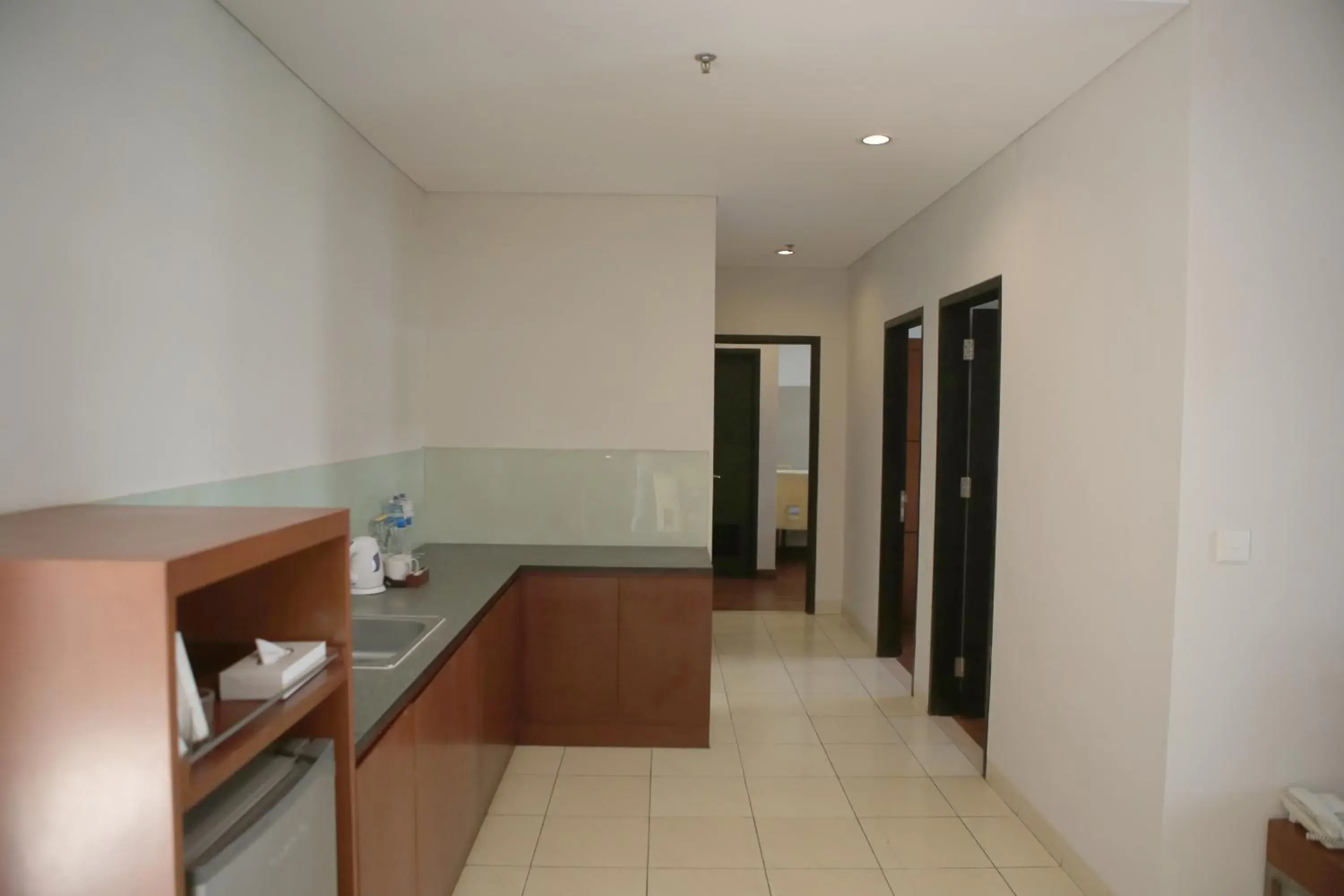 Property building, Kitchen/Kitchenette in Grand Kuta Hotel And Residence