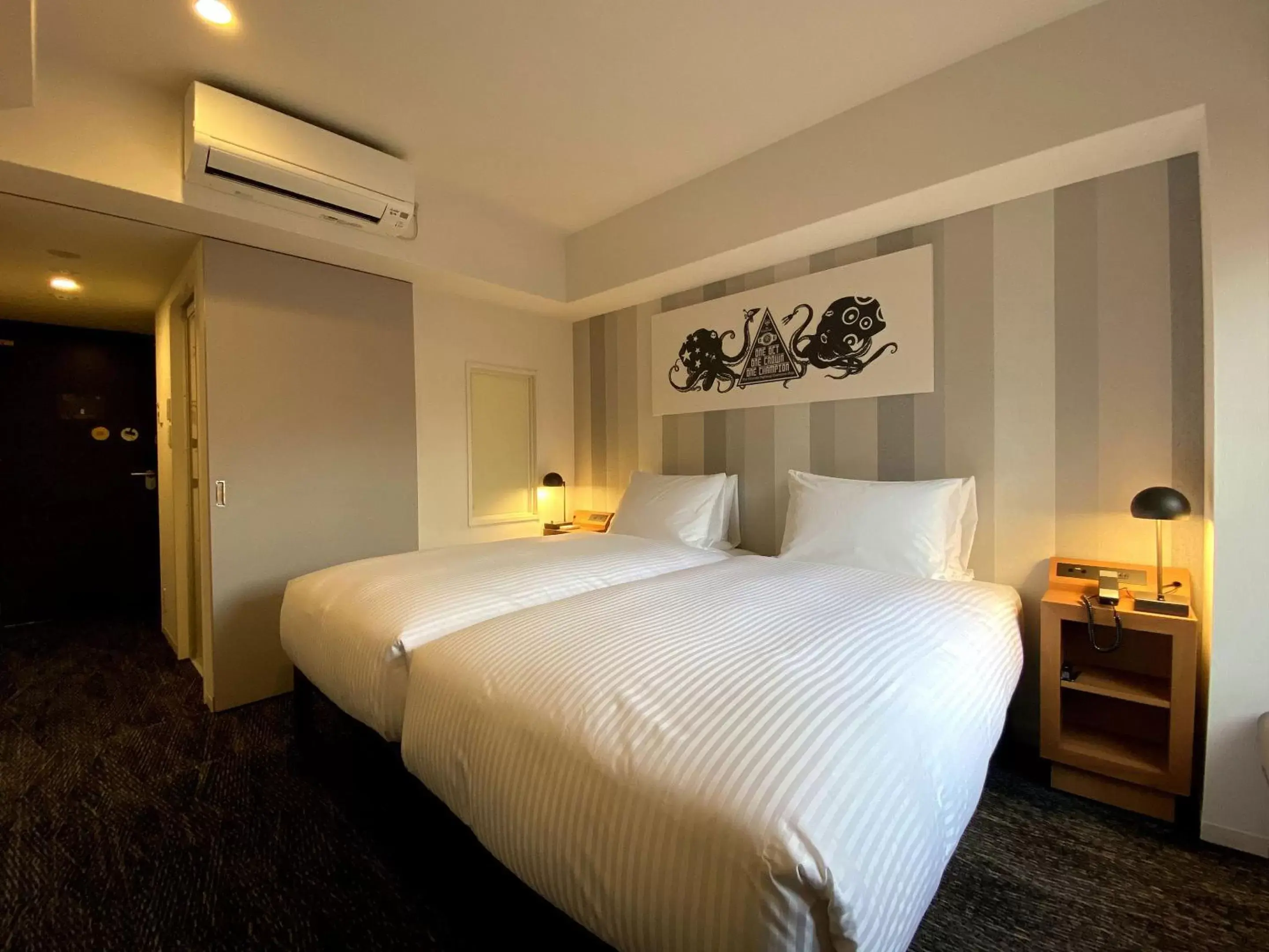 Bed in UMEDAHOLIC HOTEL Bed in UMEDAHOLIC HOTEL