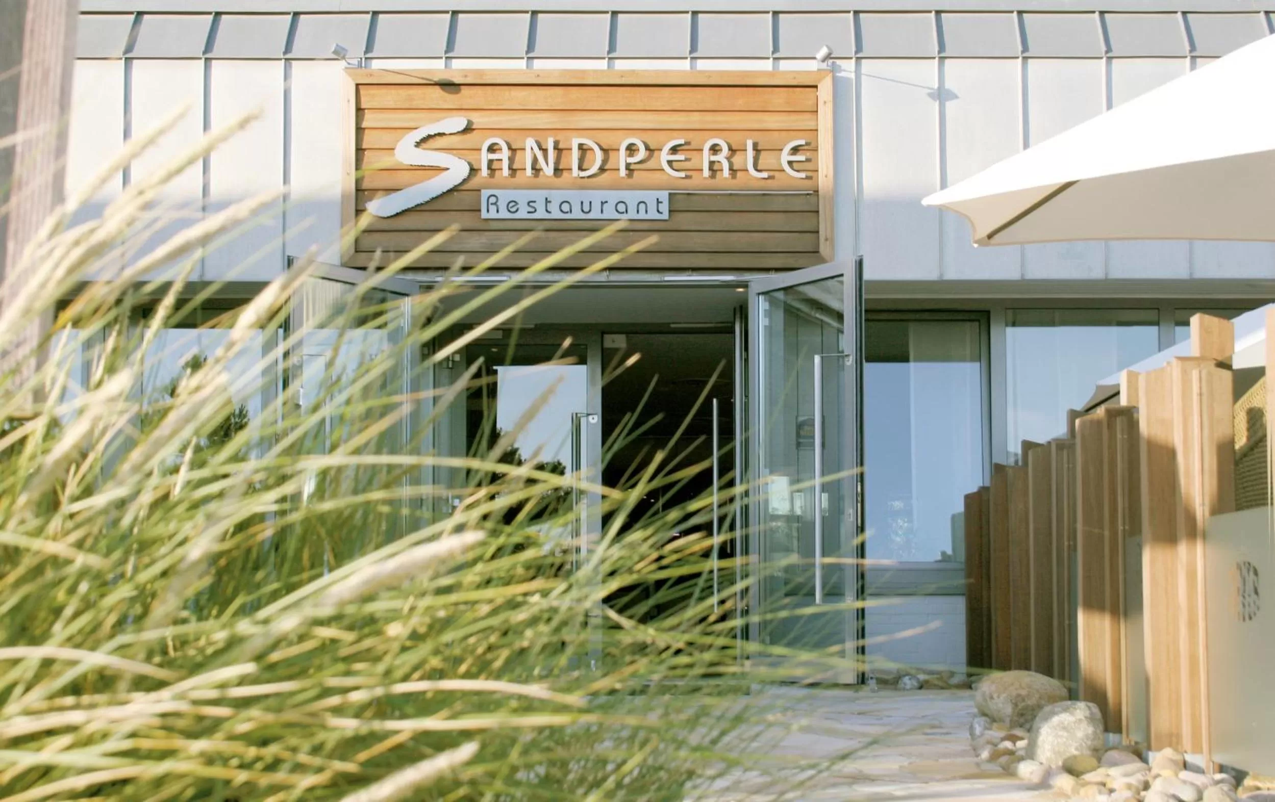 Facade/entrance in ambassador hotel & spa