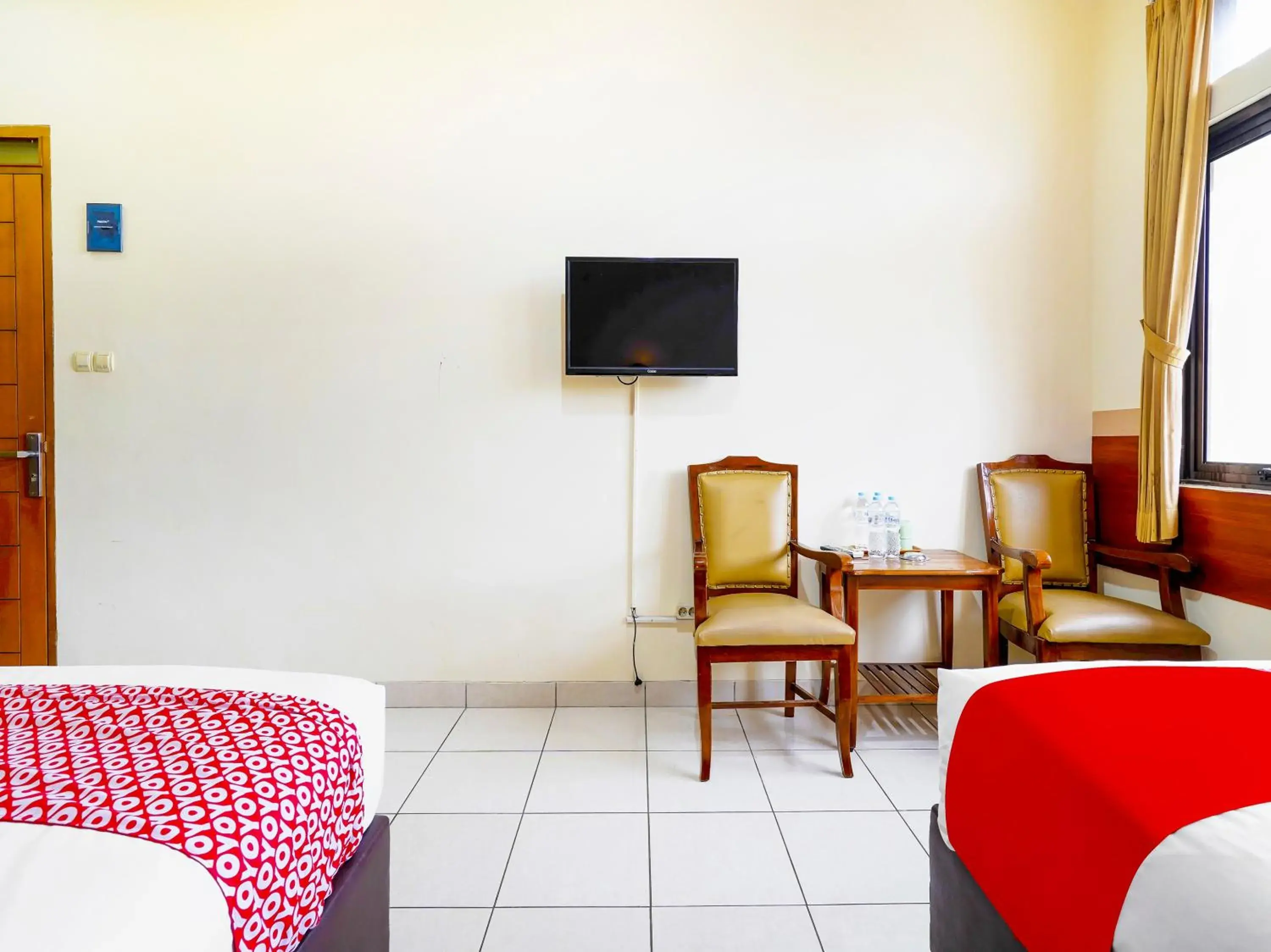 Bedroom, Seating Area in Super OYO Collection O 91297 Hotel Sakura