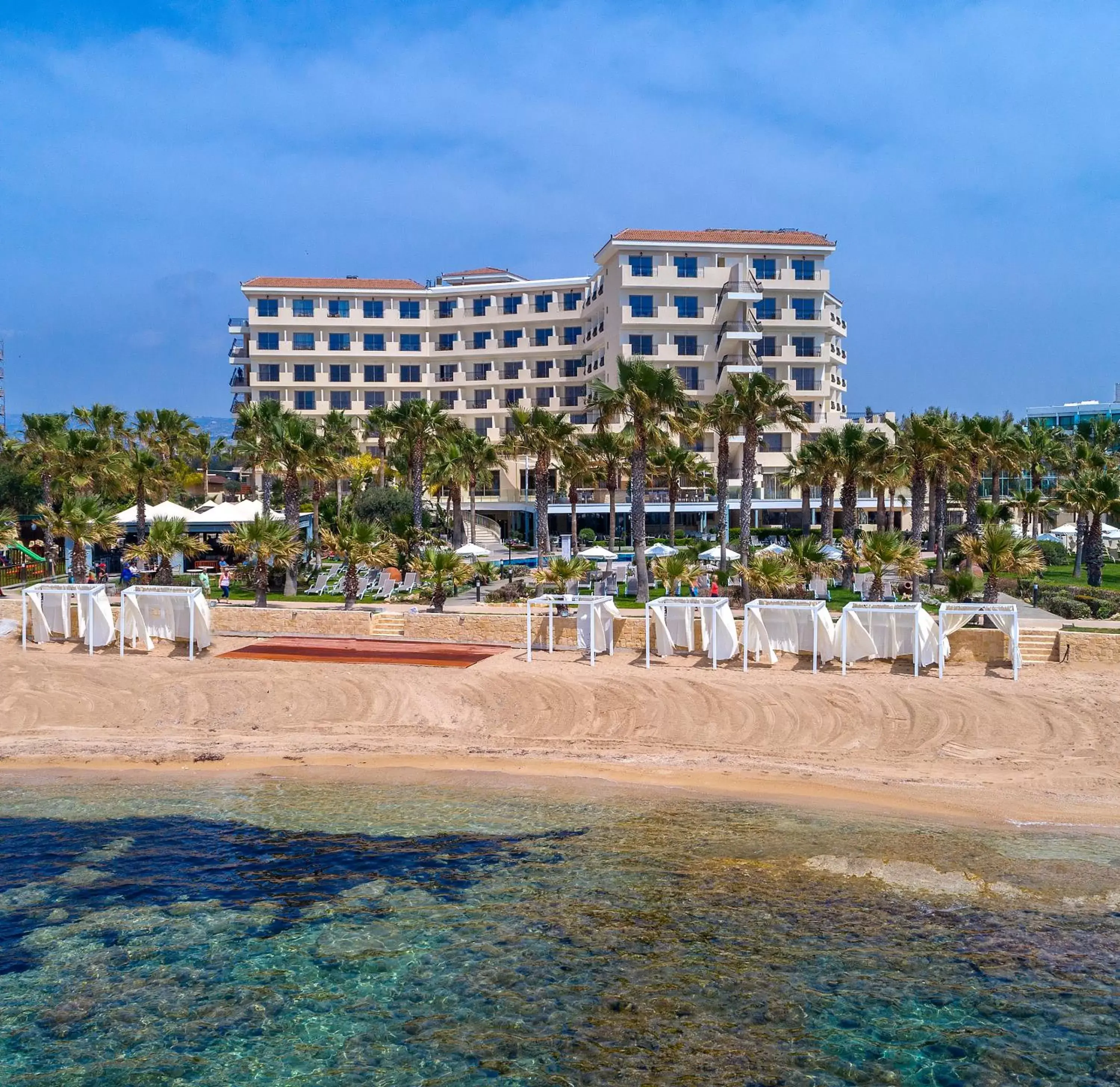 Beach, Property Building in Aquamare Beach Hotel & Spa