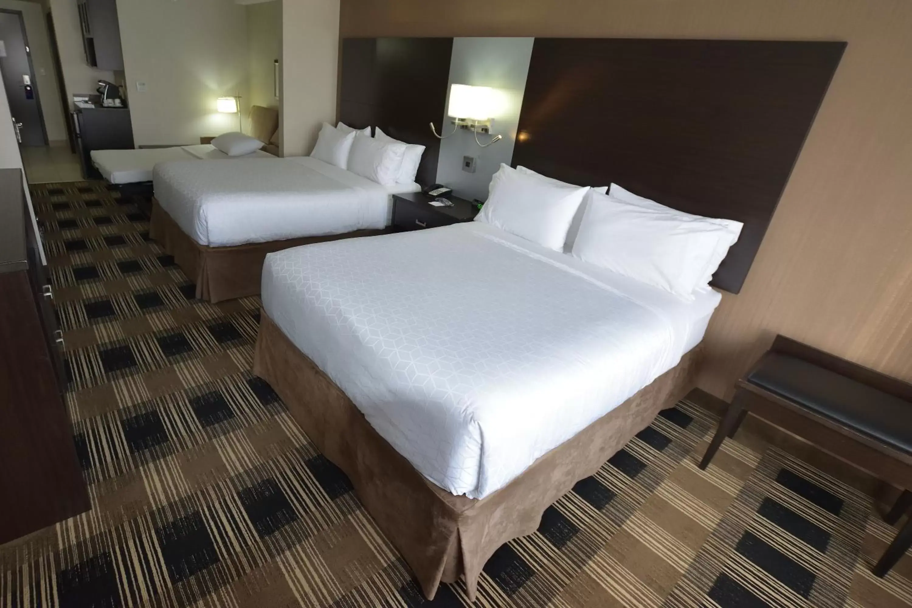 Bed in Holiday Inn Express & Suites Ottawa East-Orleans, an IHG Hotel