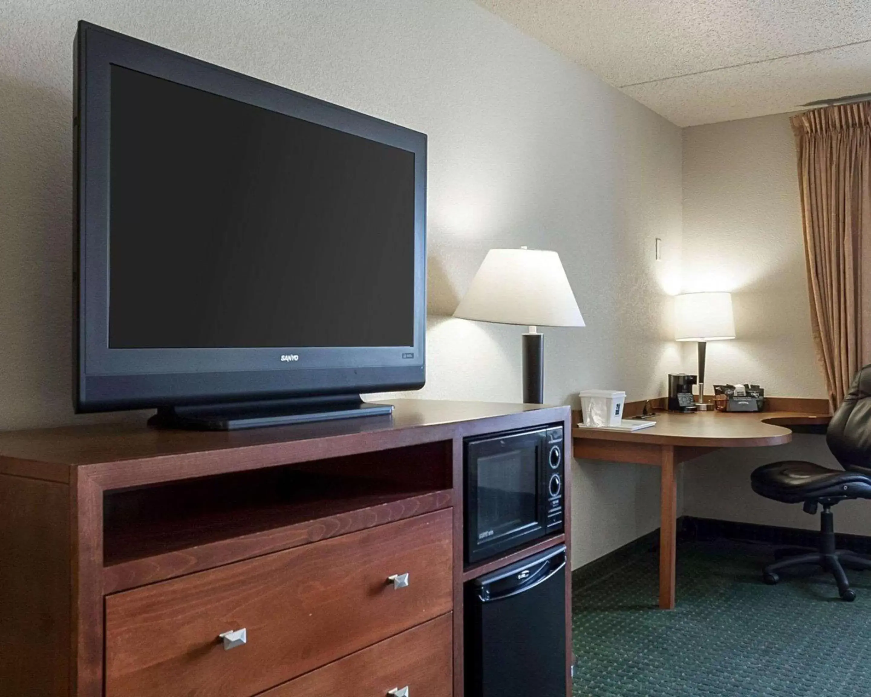 Photo of the whole room, TV/Entertainment Center in Quality Inn & Suites Conference Center and Water Park