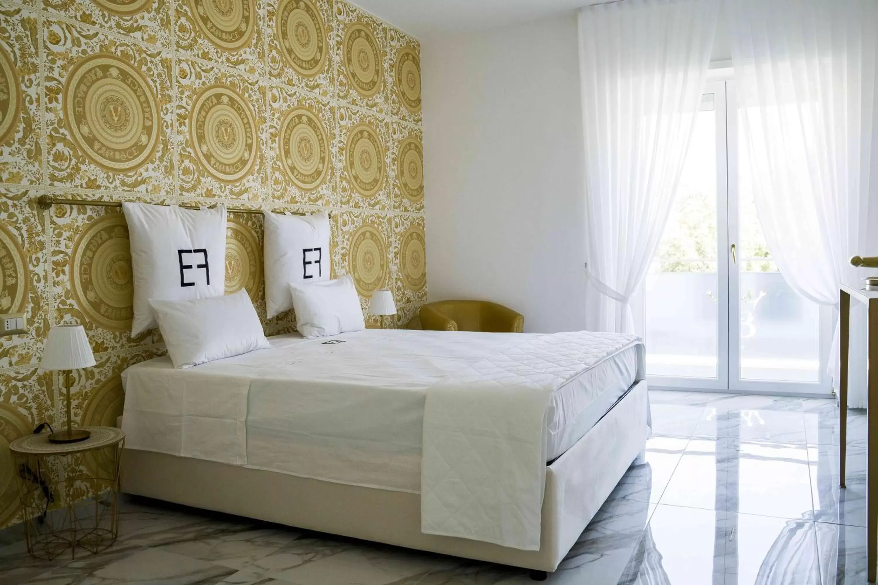 Bed in EF LUXURY LIVING RESORT AND SPA