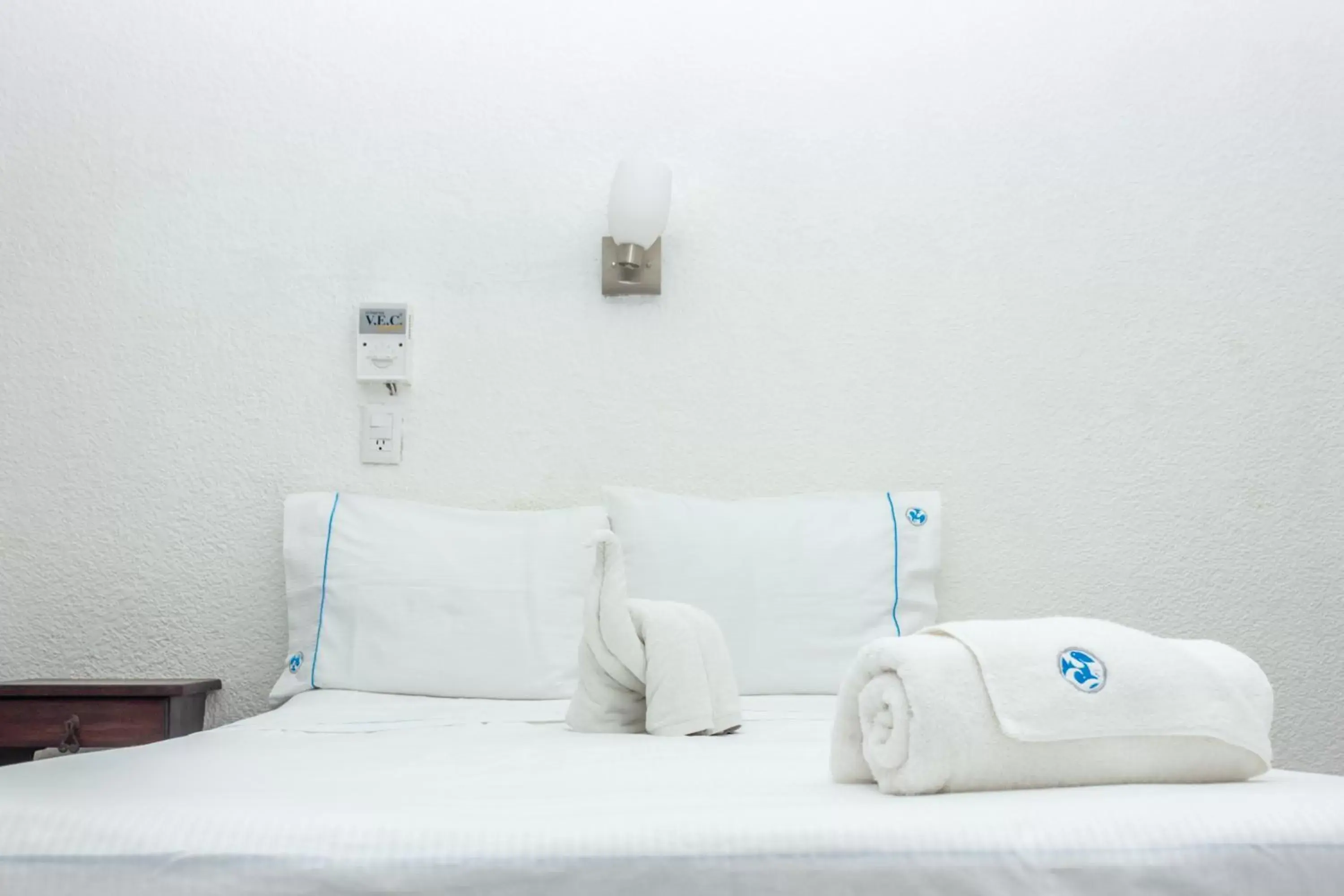 Bed in Pelicano Inn Playa del Carmen - Beachfront Hotel