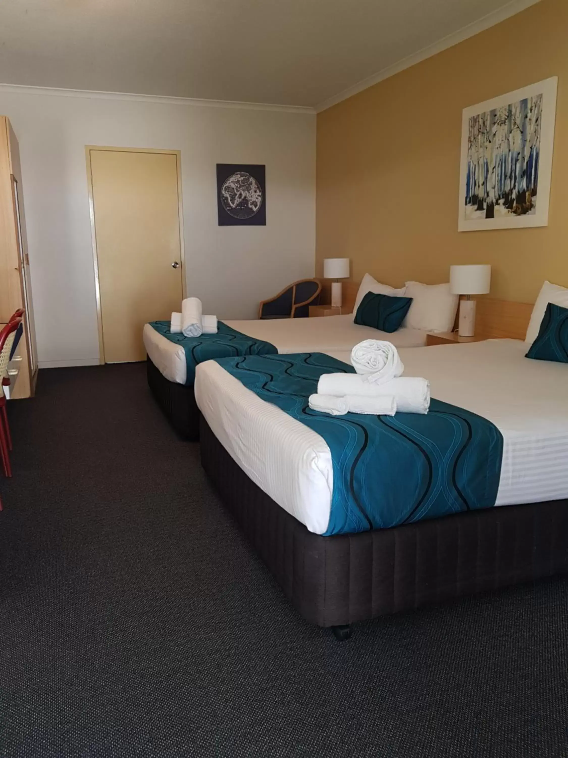 Bed in The Q Motel Rockhampton