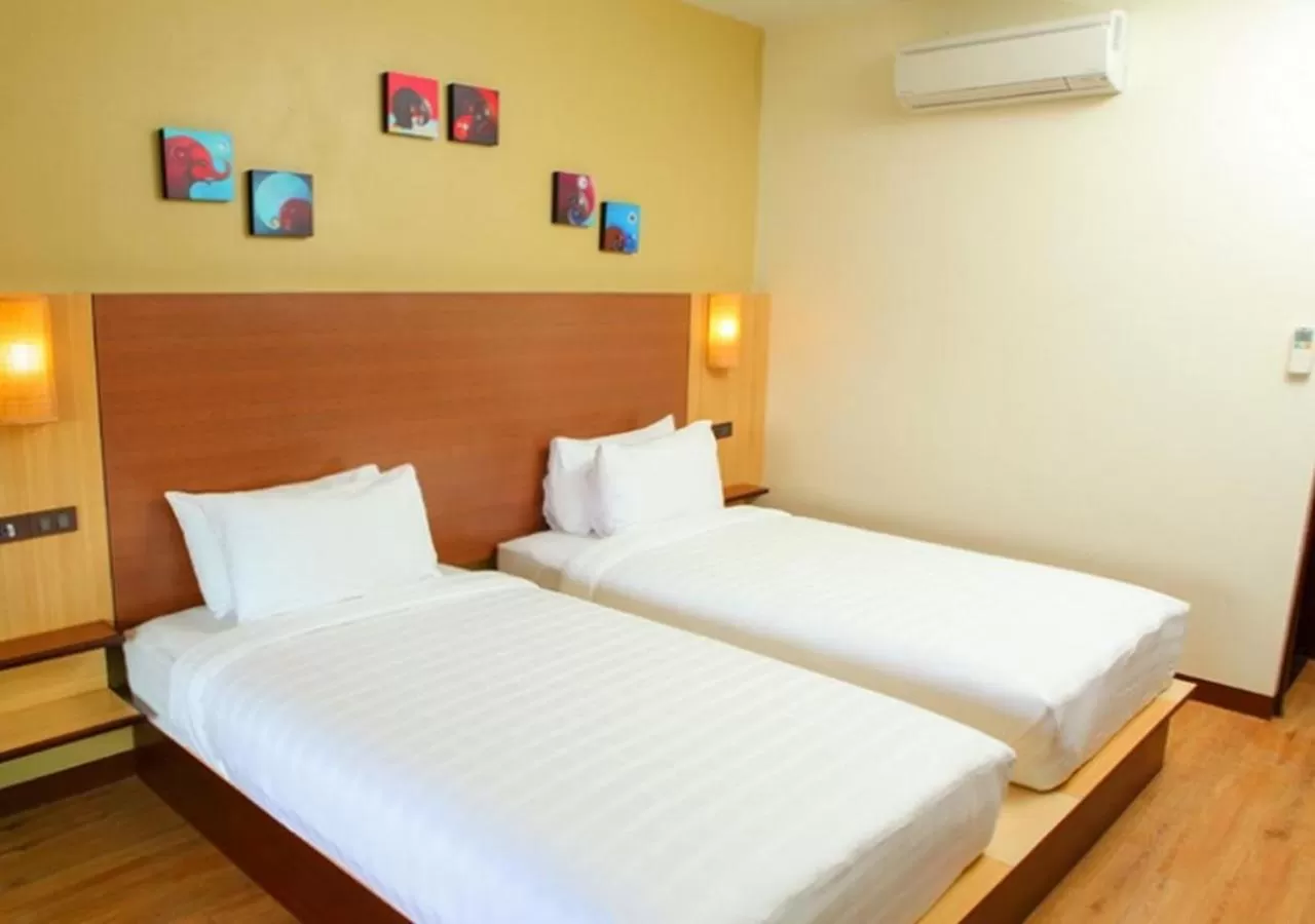 Bed in BB Mantra Boutique Hotel