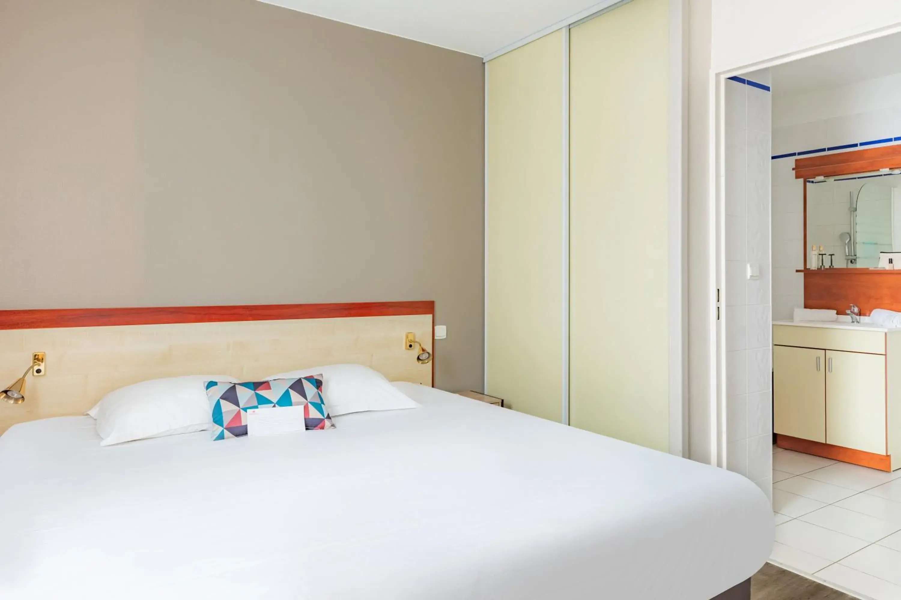 Bed in Appart'City Classic Limoges Bed in Appart'City Classic Limoges