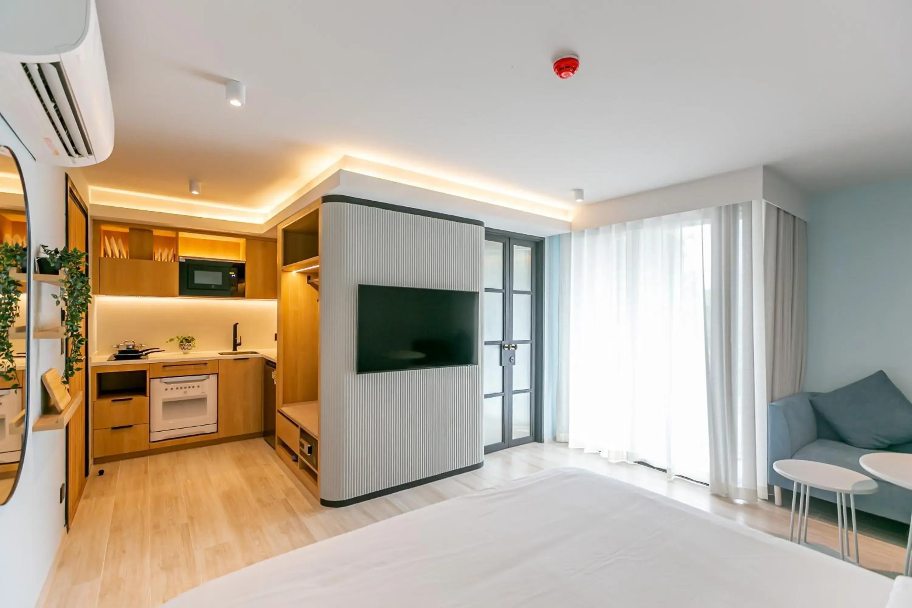 Photo of the whole room, TV/Entertainment Center in The SACHA Apart-Hotel Thonglor