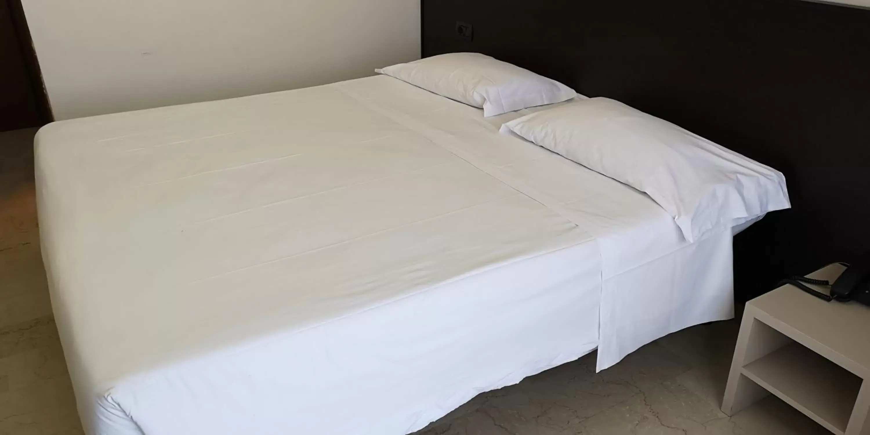 Bed in AUTO PARK Hotel