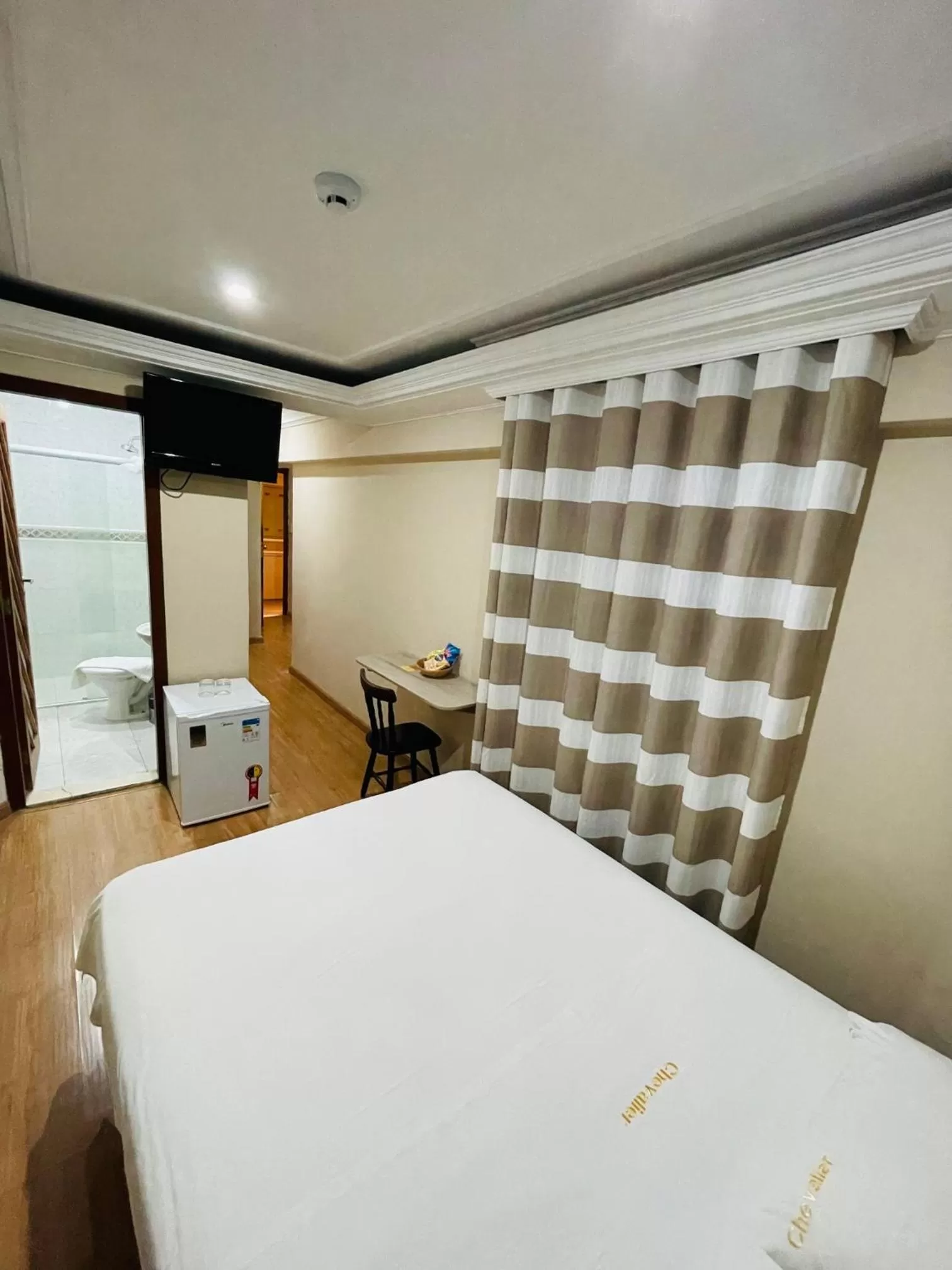 Bed in Gran Chevalier Hotel