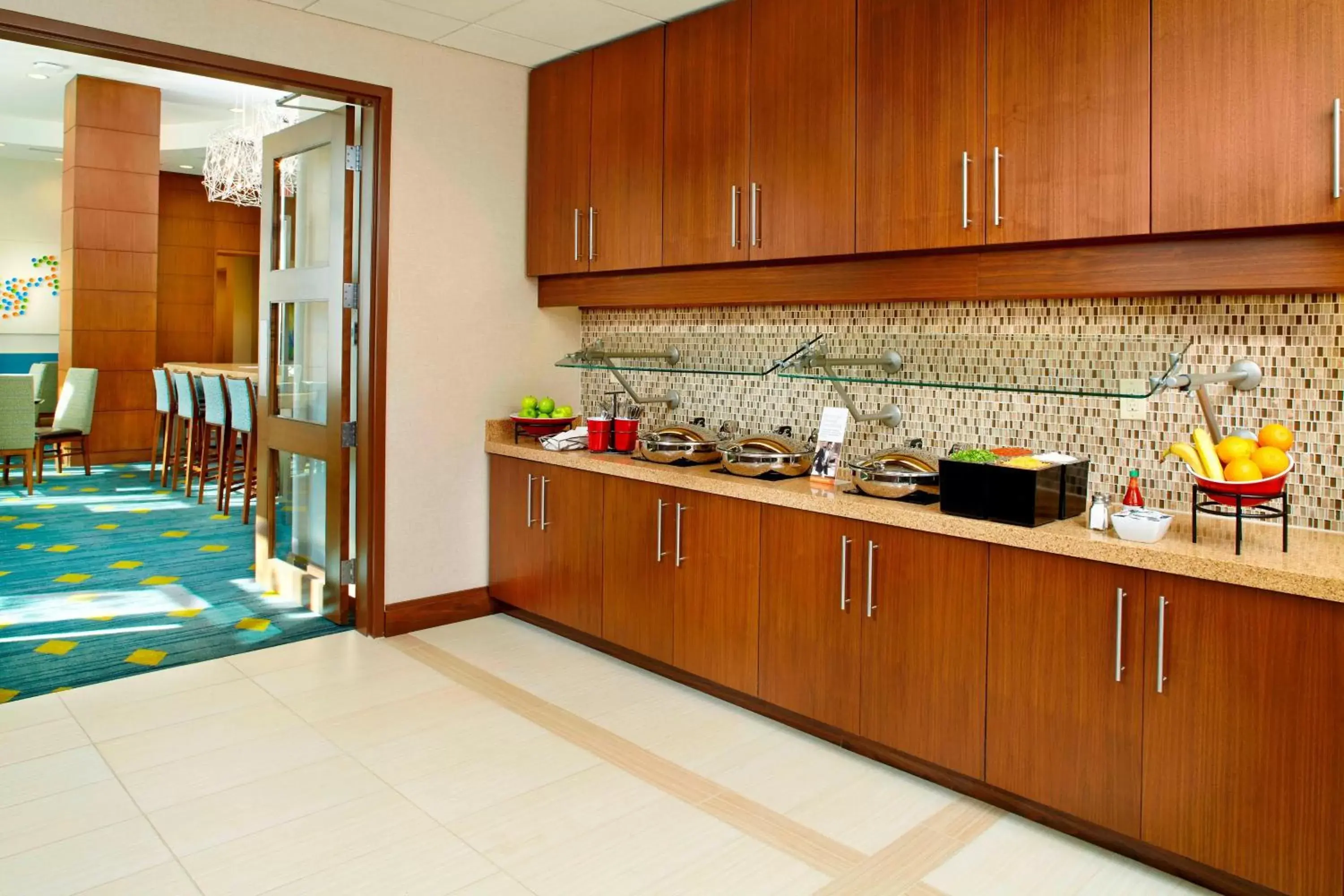 Breakfast, Kitchen/Kitchenette in Residence Inn by Marriott Orlando Lake Nona