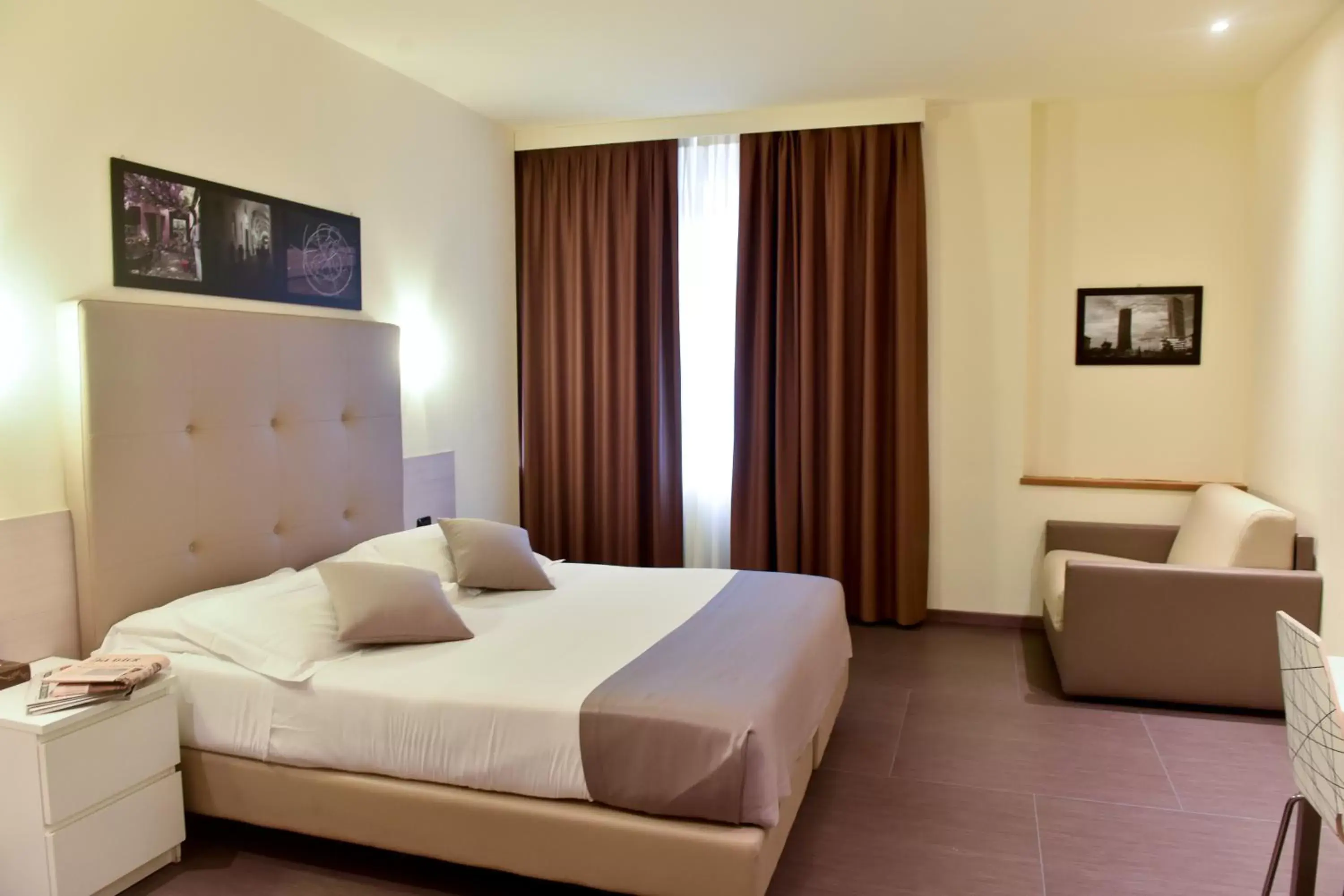 Bed in Duomo Hotel & Apartments